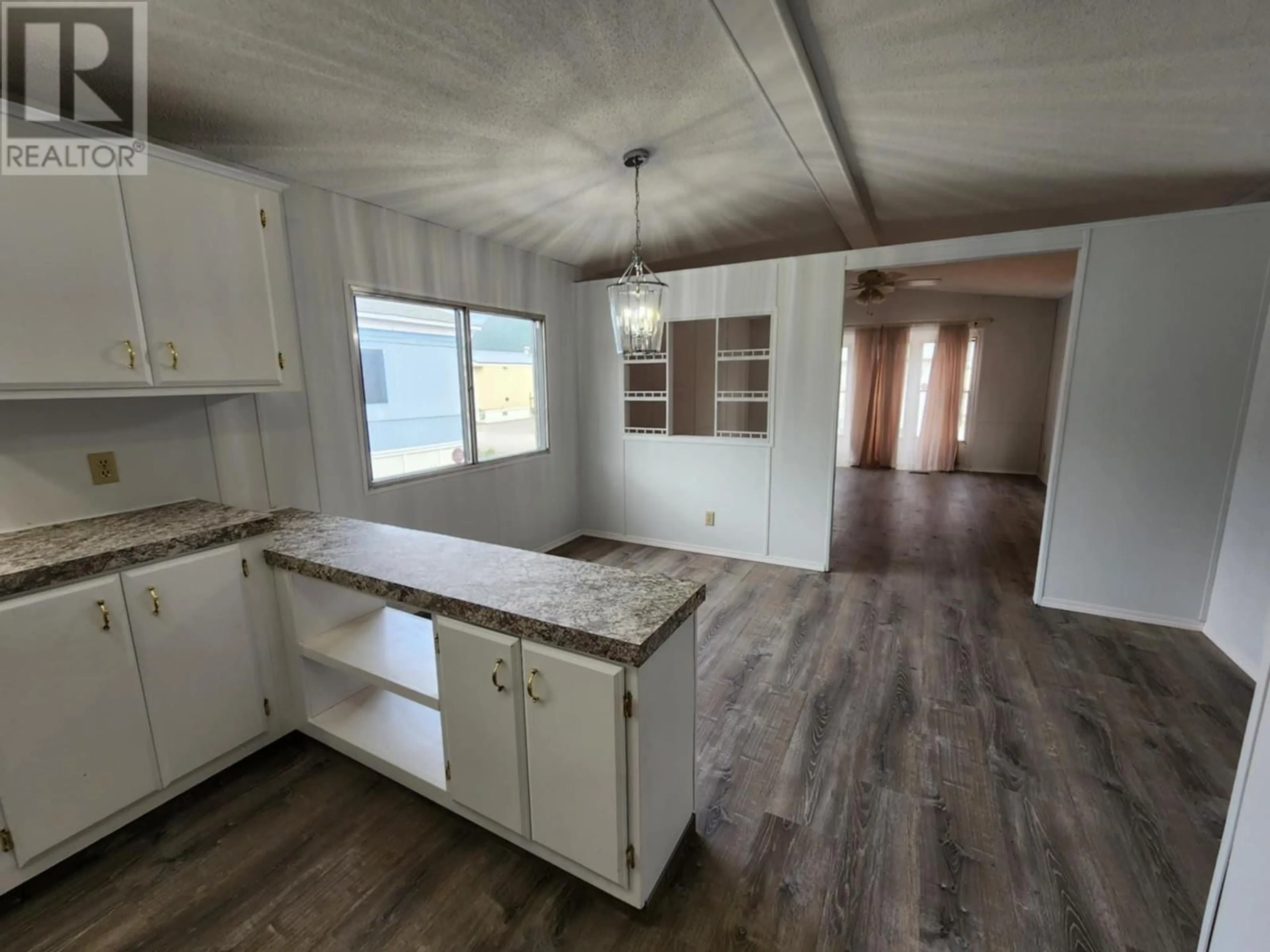 Open concept kitchen, unknown for 2313 Shuswap Avenue Unit# 32, Lumby British Columbia V0E2G0