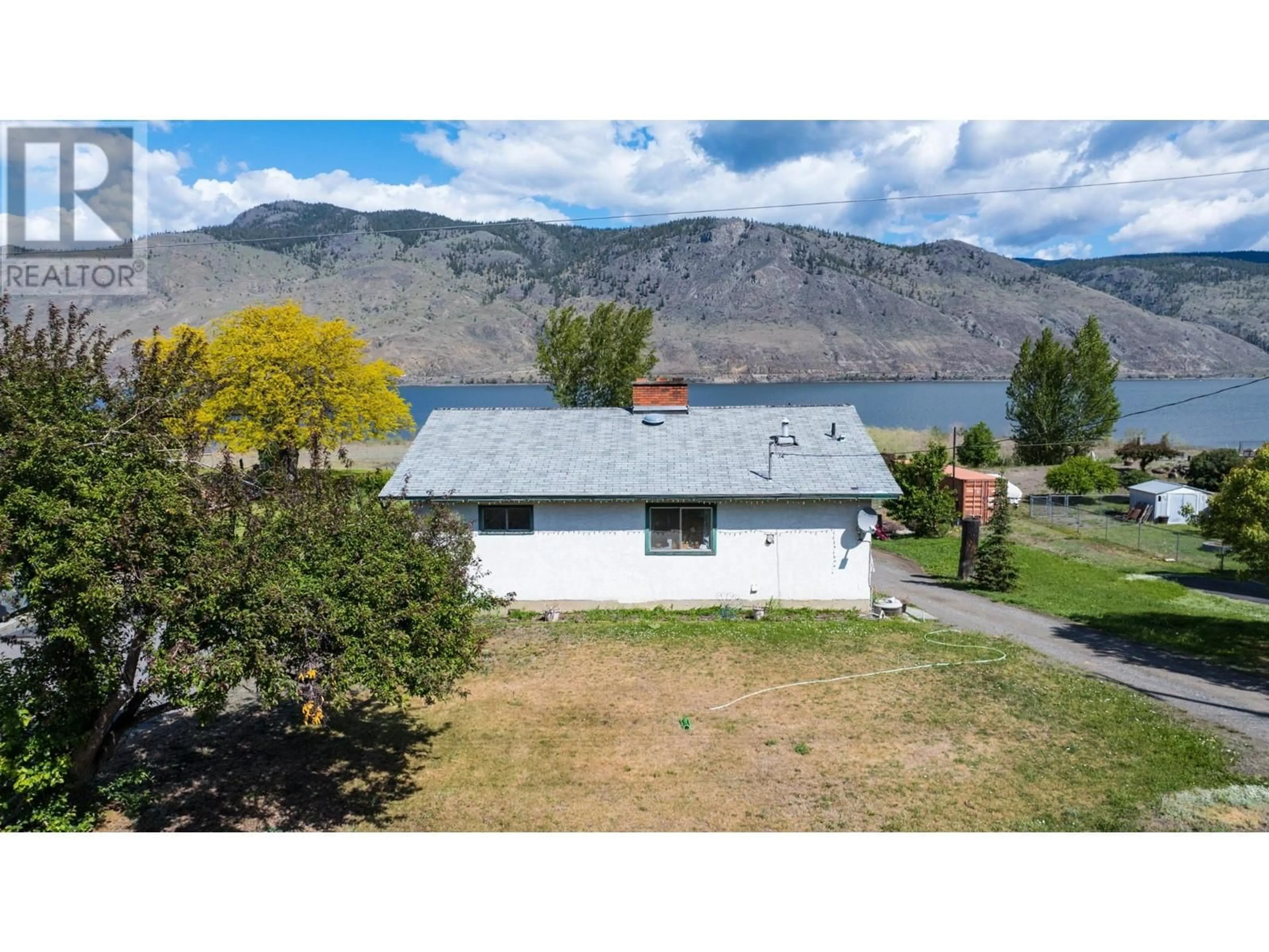 A pic from outside/outdoor area/front of a property/back of a property/a pic from drone, mountain view for 6825 SAVONA ACCESS ROAD, Kamloops British Columbia V0K2J0