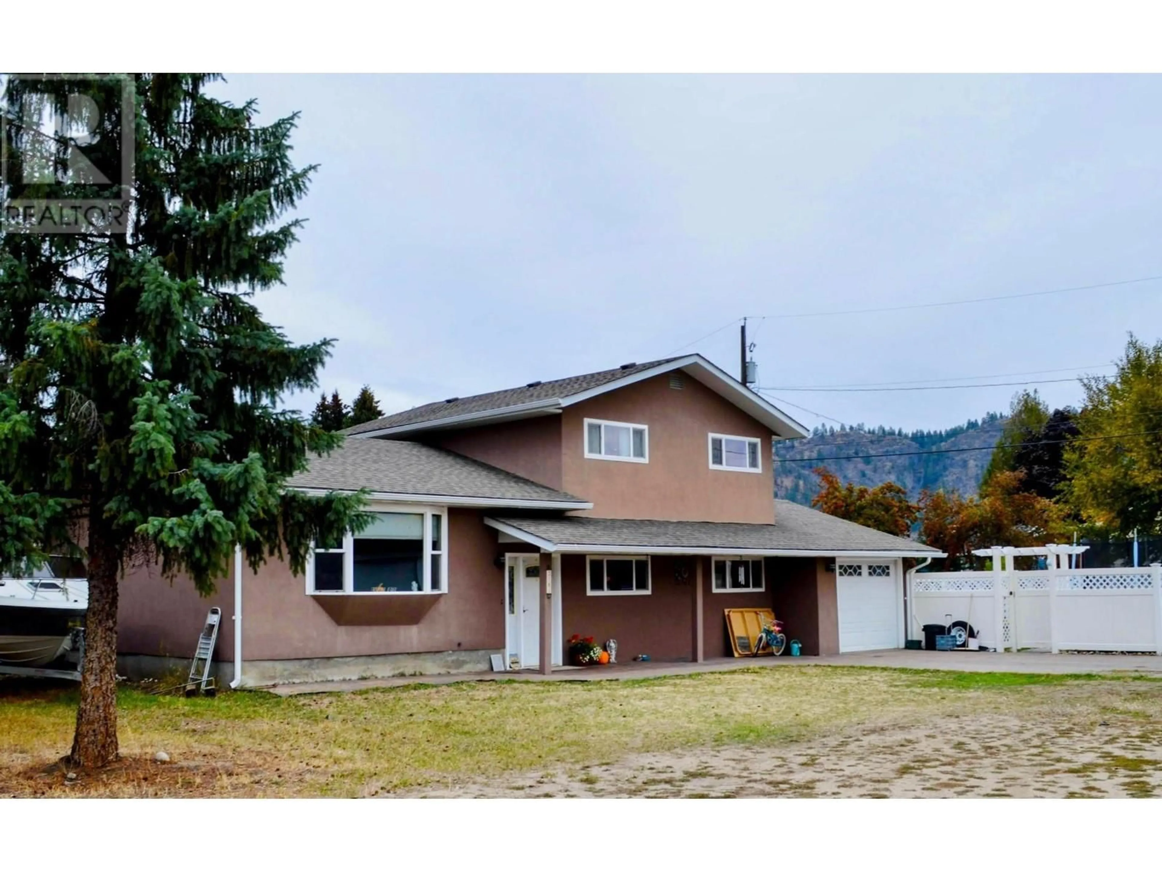 Home with vinyl exterior material, mountain view for 2181 72ND Avenue, Grand Forks British Columbia V0H1H0