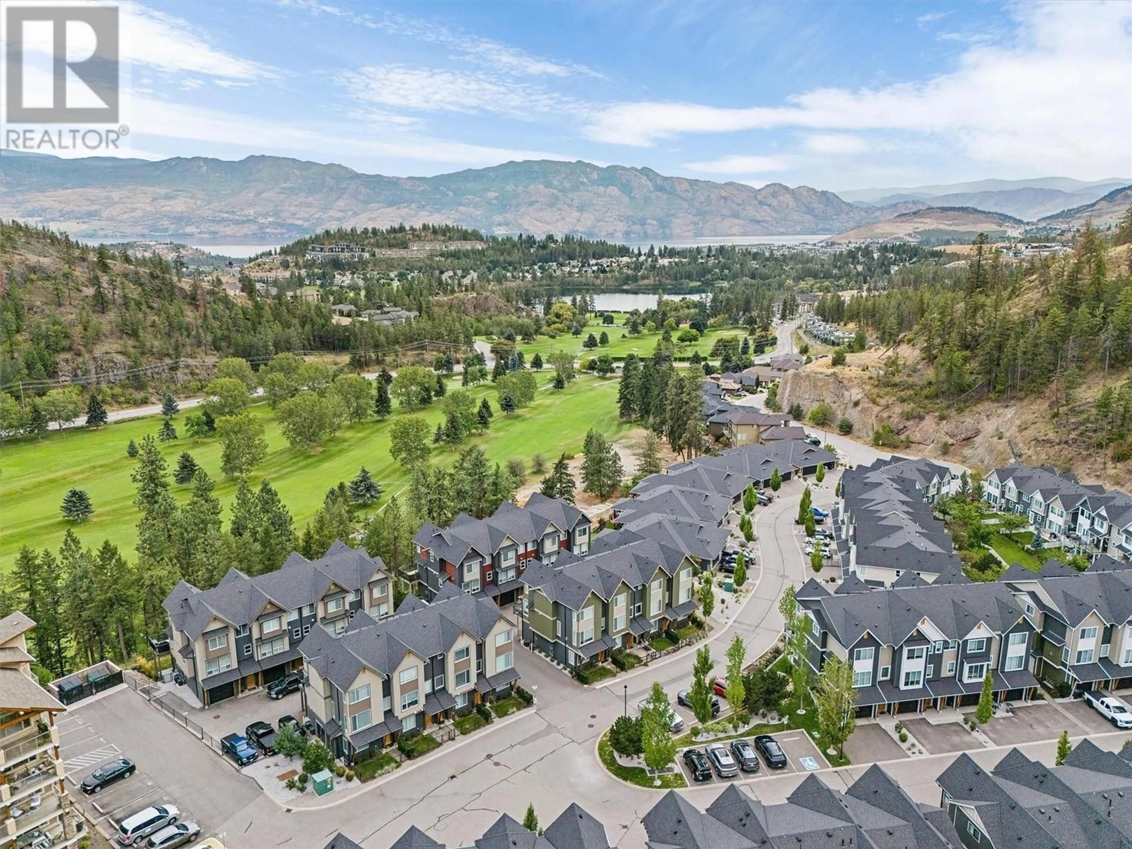 A pic from outside/outdoor area/front of a property/back of a property/a pic from drone, mountain view for 2490 Tuscany Drive Unit# 26, West Kelowna British Columbia V4T3B6