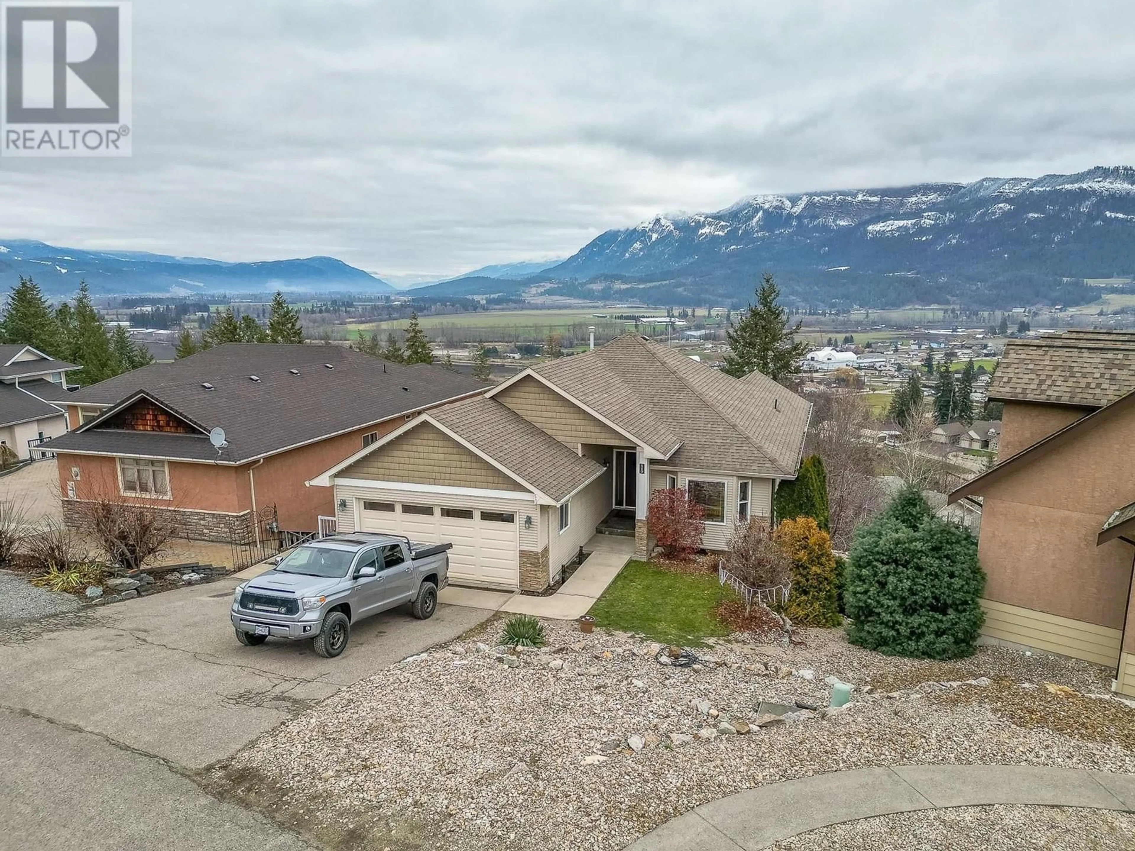 A pic from outside/outdoor area/front of a property/back of a property/a pic from drone, mountain view for 110 RED ROCK CRESCENT, Enderby British Columbia V0E1V1