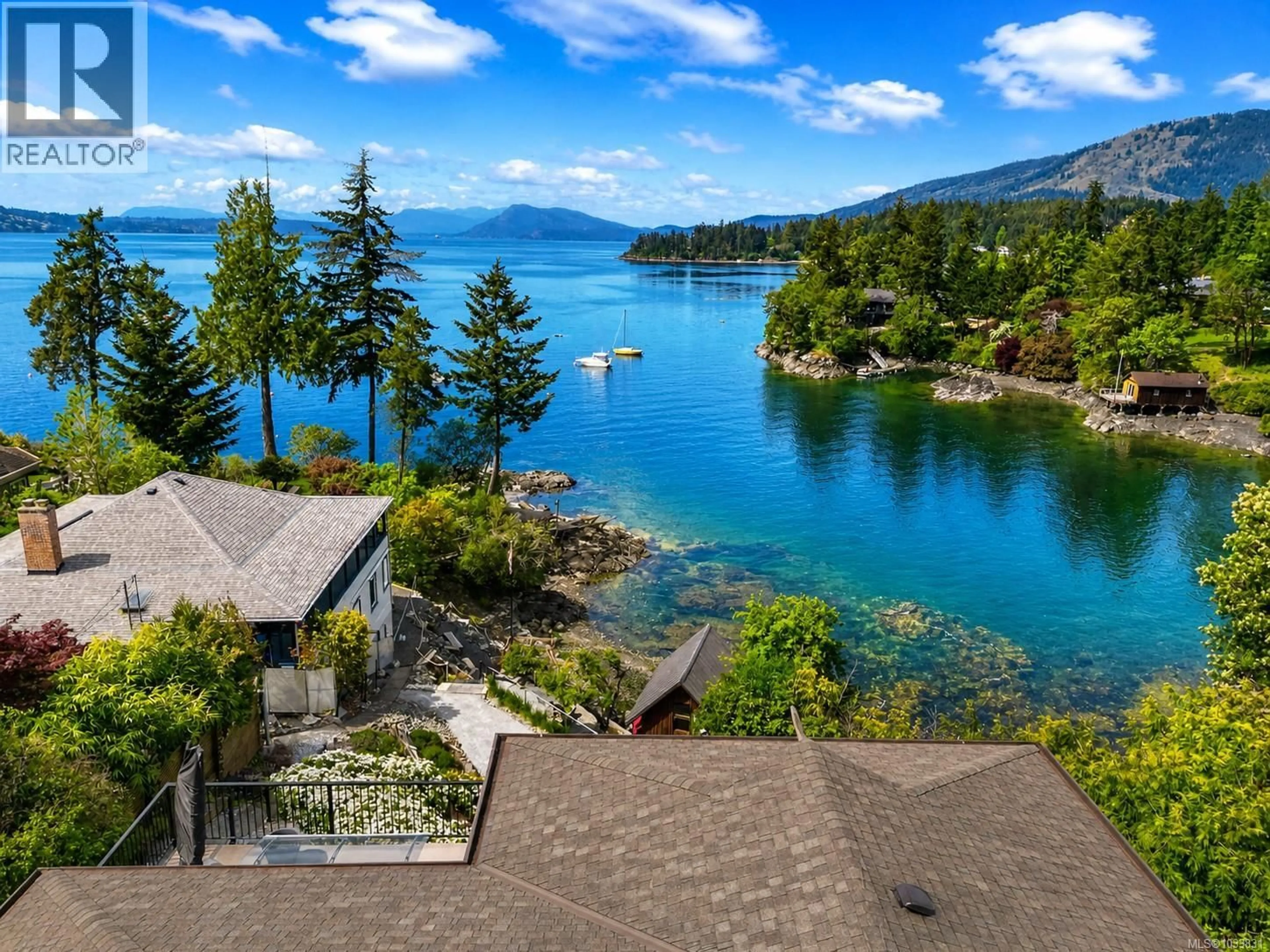 A pic from outside/outdoor area/front of a property/back of a property/a pic from drone, water/lake/river/ocean view for 598 MELDRAM DRIVE, North Saanich British Columbia V8L5V8