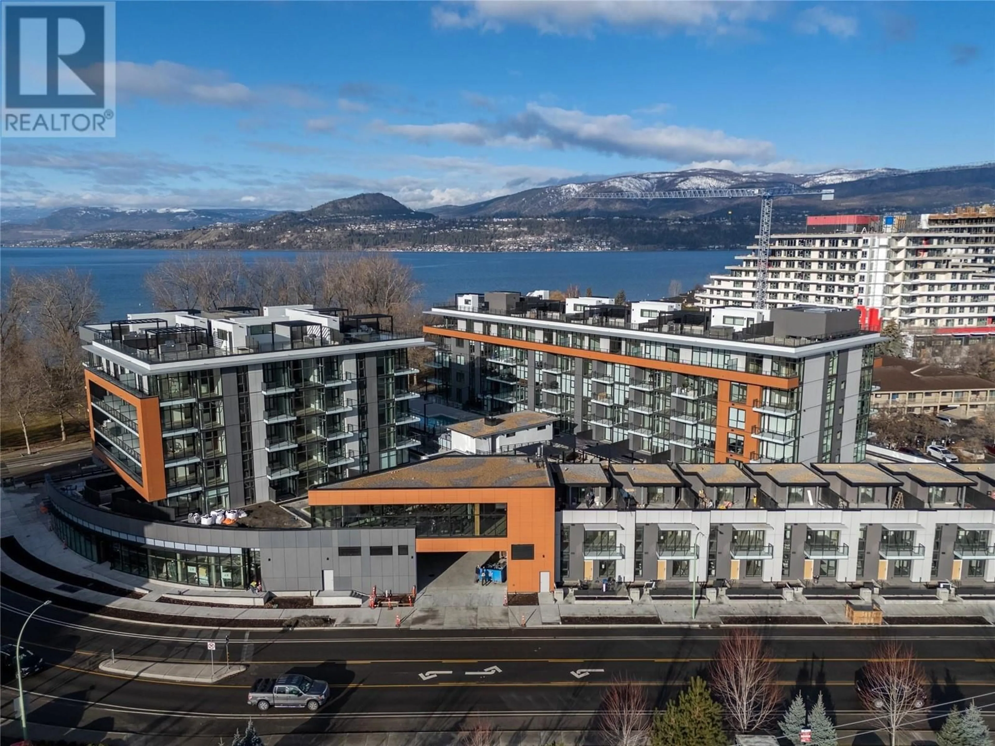 A pic from outside/outdoor area/front of a property/back of a property/a pic from drone, city buildings view from balcony for S308 - 3409 LAKESHORE ROAD, Kelowna British Columbia V1W0G6