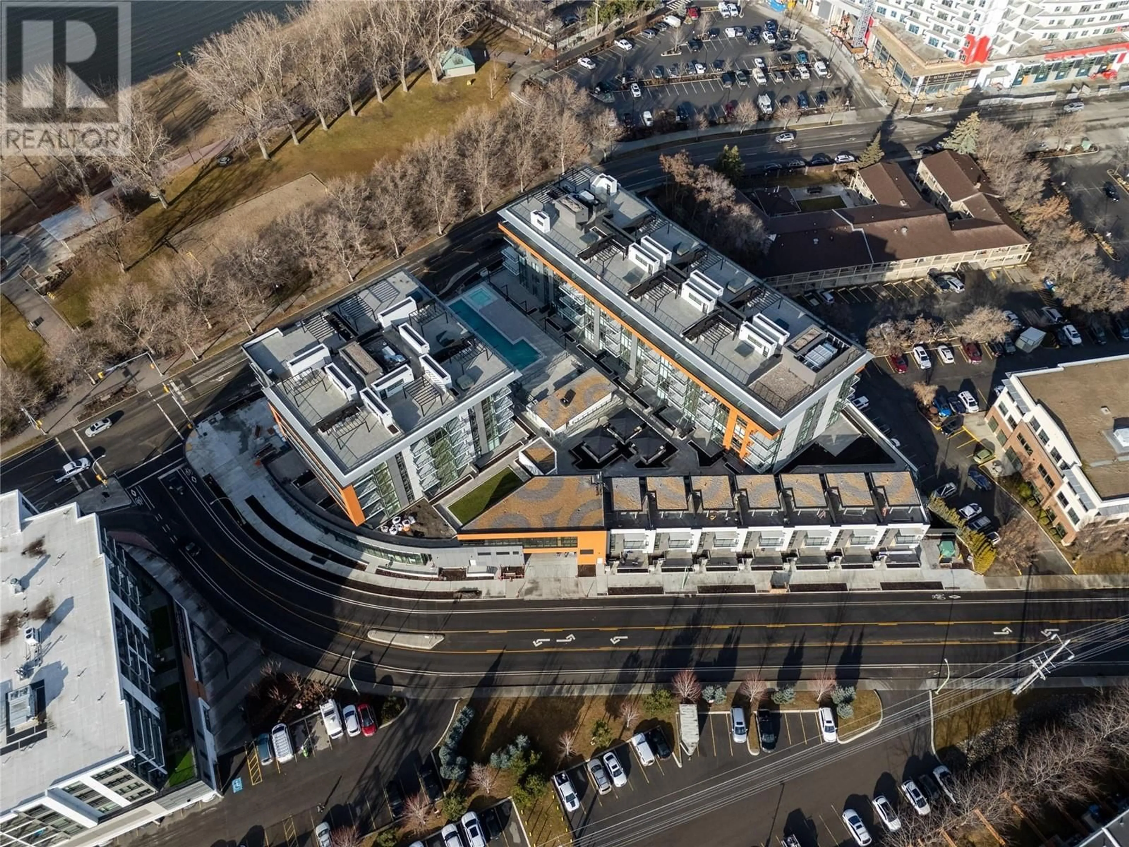 A pic from outside/outdoor area/front of a property/back of a property/a pic from drone, city buildings view from balcony for S308 - 3409 LAKESHORE ROAD, Kelowna British Columbia V1W0G6