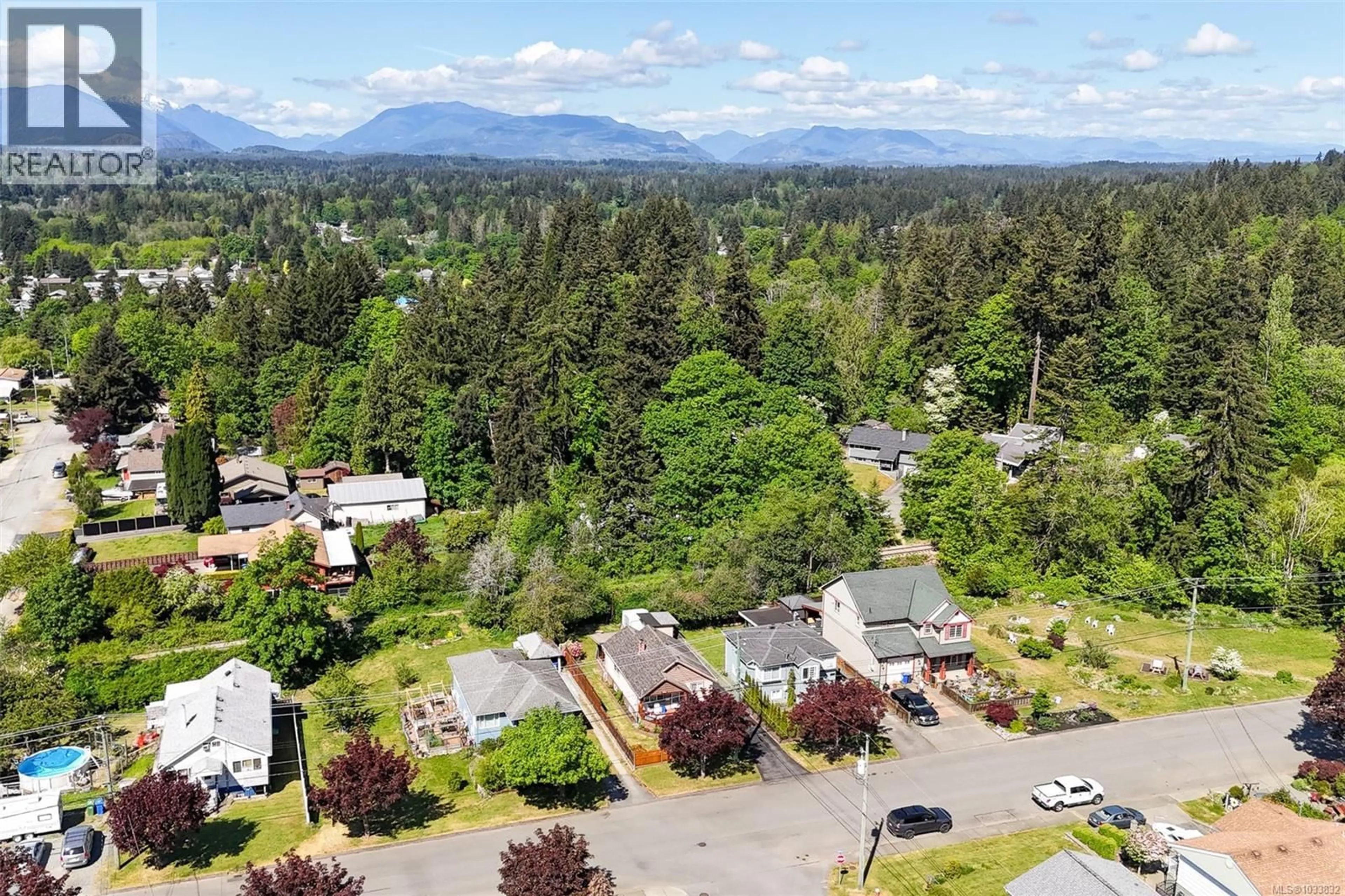 A pic from outside/outdoor area/front of a property/back of a property/a pic from drone, mountain view for 4964 LESLIE AVENUE, Port Alberni British Columbia V9Y6S4