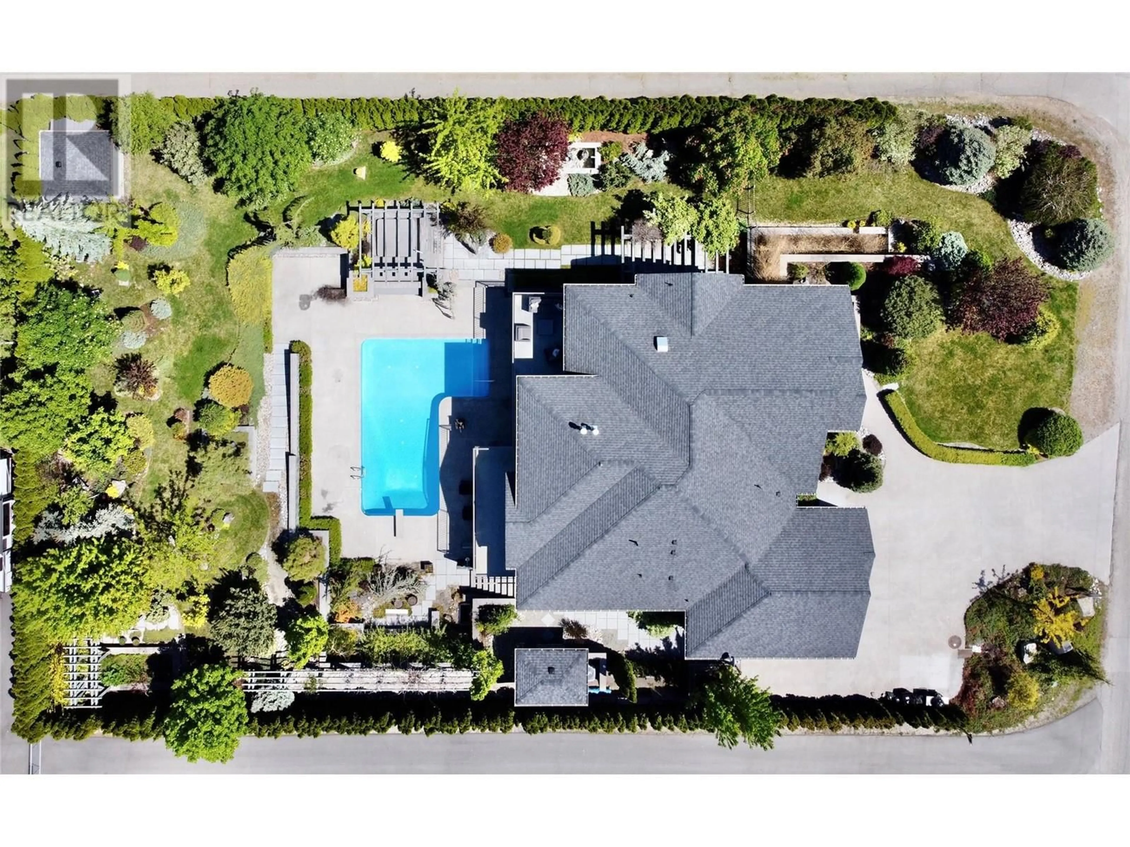A pic from outside/outdoor area/front of a property/back of a property/a pic from drone, unknown for 5642 YARROW STREET, Oliver British Columbia V0H1T0
