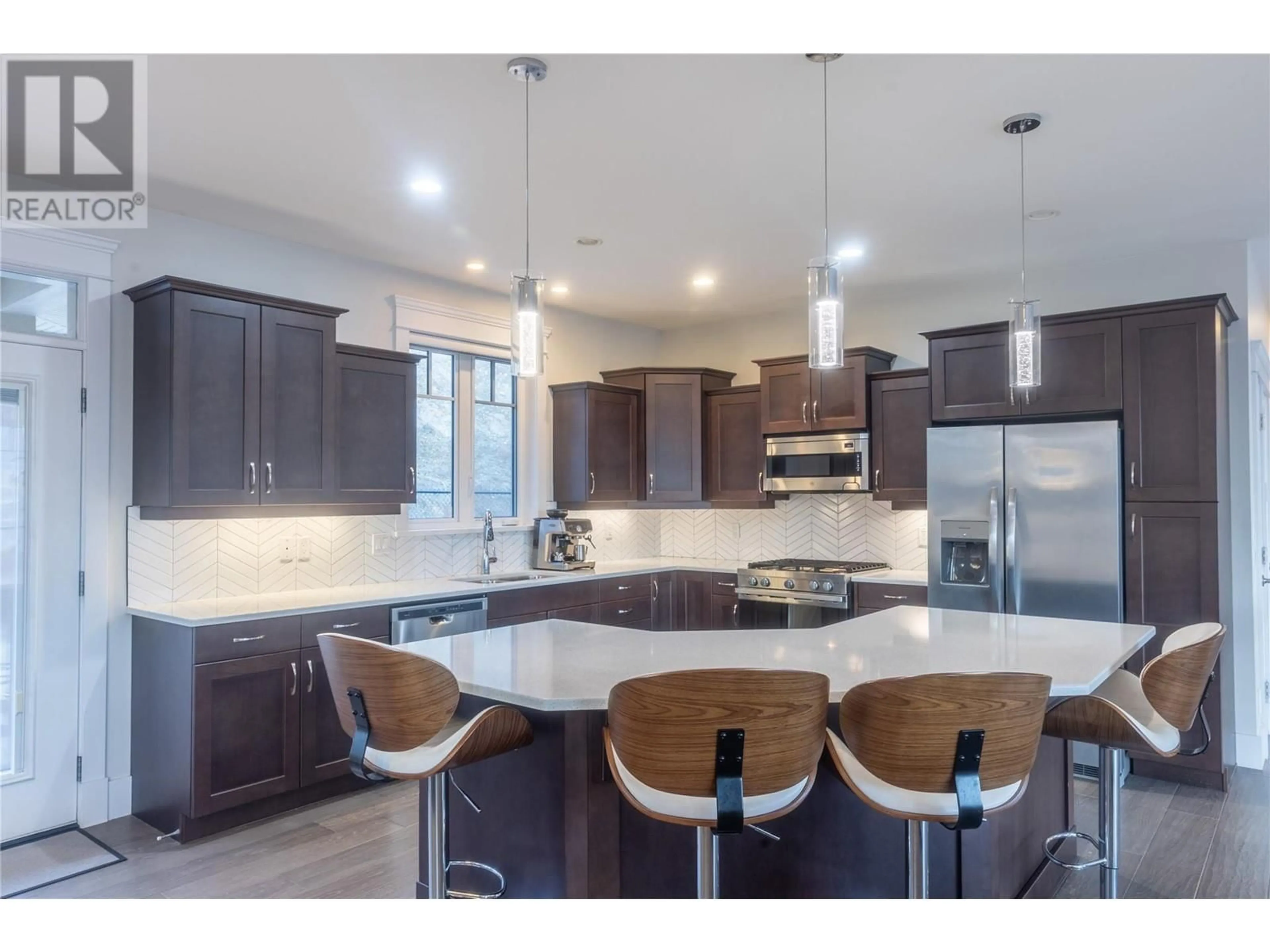 Open concept kitchen, unknown for 7229 Edgewater Place, Coldstream British Columbia V1B4C5