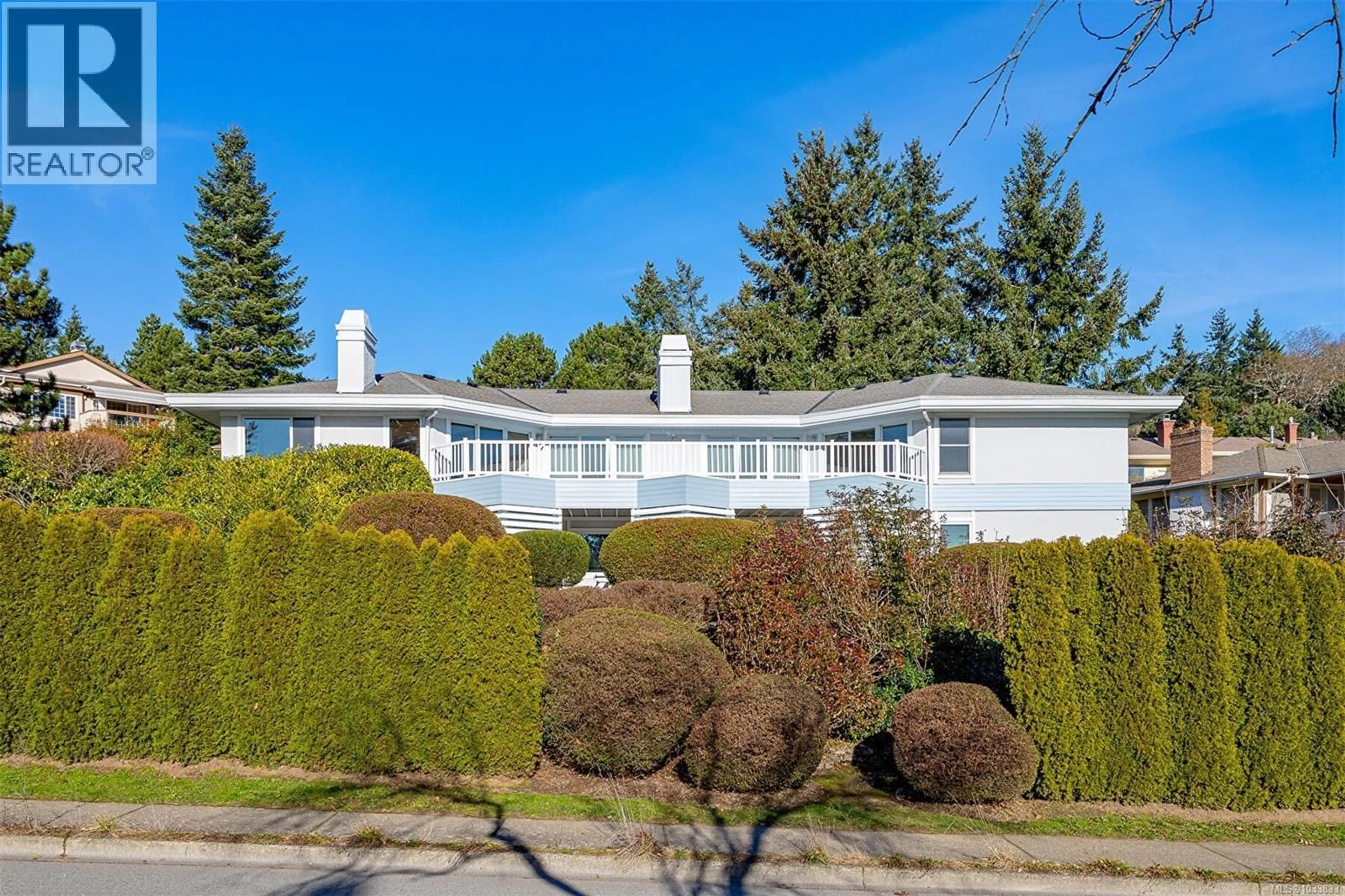 Home with vinyl exterior material, street for 4569 BOULDERWOOD DRIVE, Saanich British Columbia V8Y3A5
