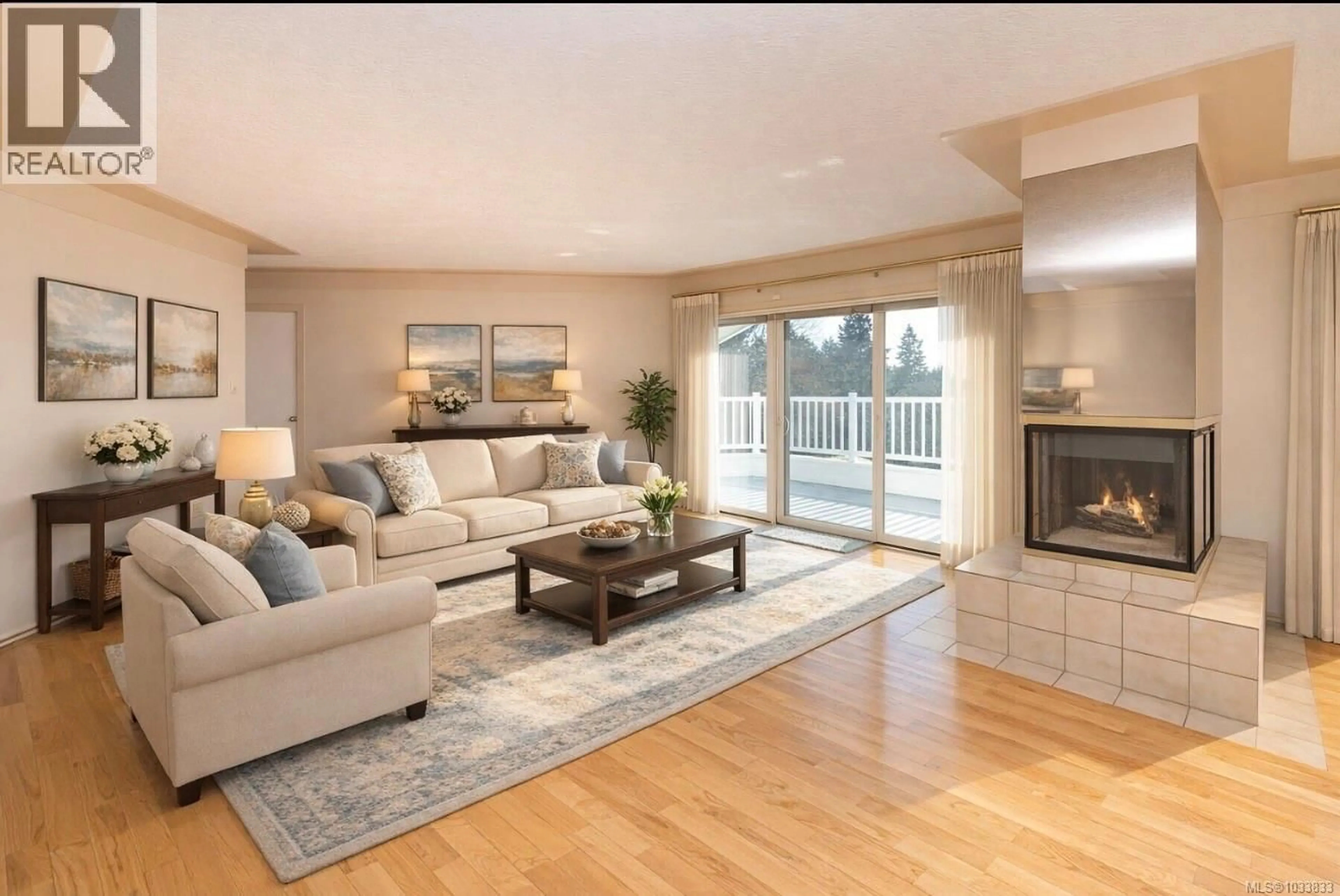 Living room with furniture, wood/laminate floor for 4569 BOULDERWOOD DRIVE, Saanich British Columbia V8Y3A5