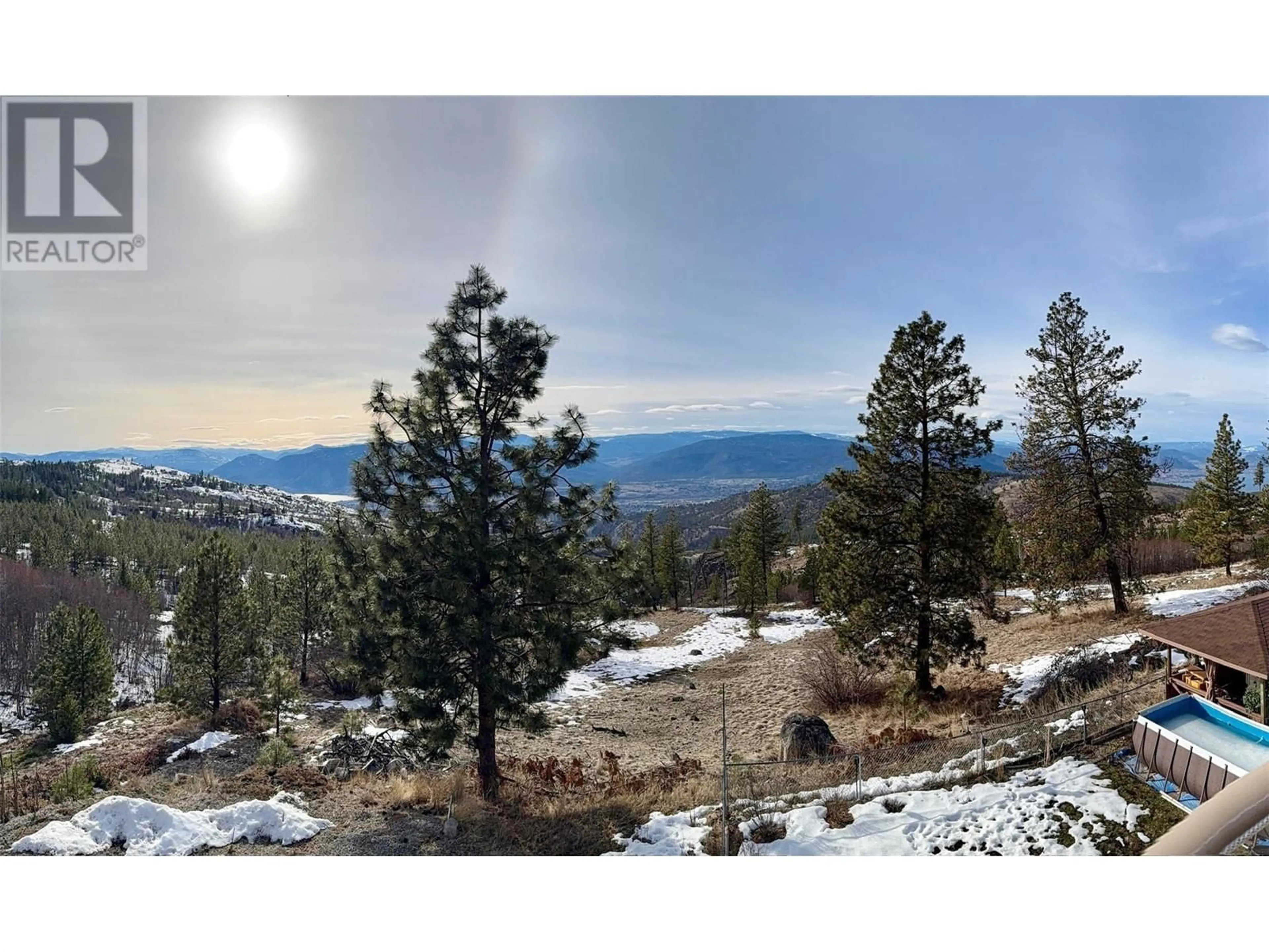 A pic from outside/outdoor area/front of a property/back of a property/a pic from drone, mountain view for 123 BEAR END ROAD, Penticton British Columbia V2A8V6