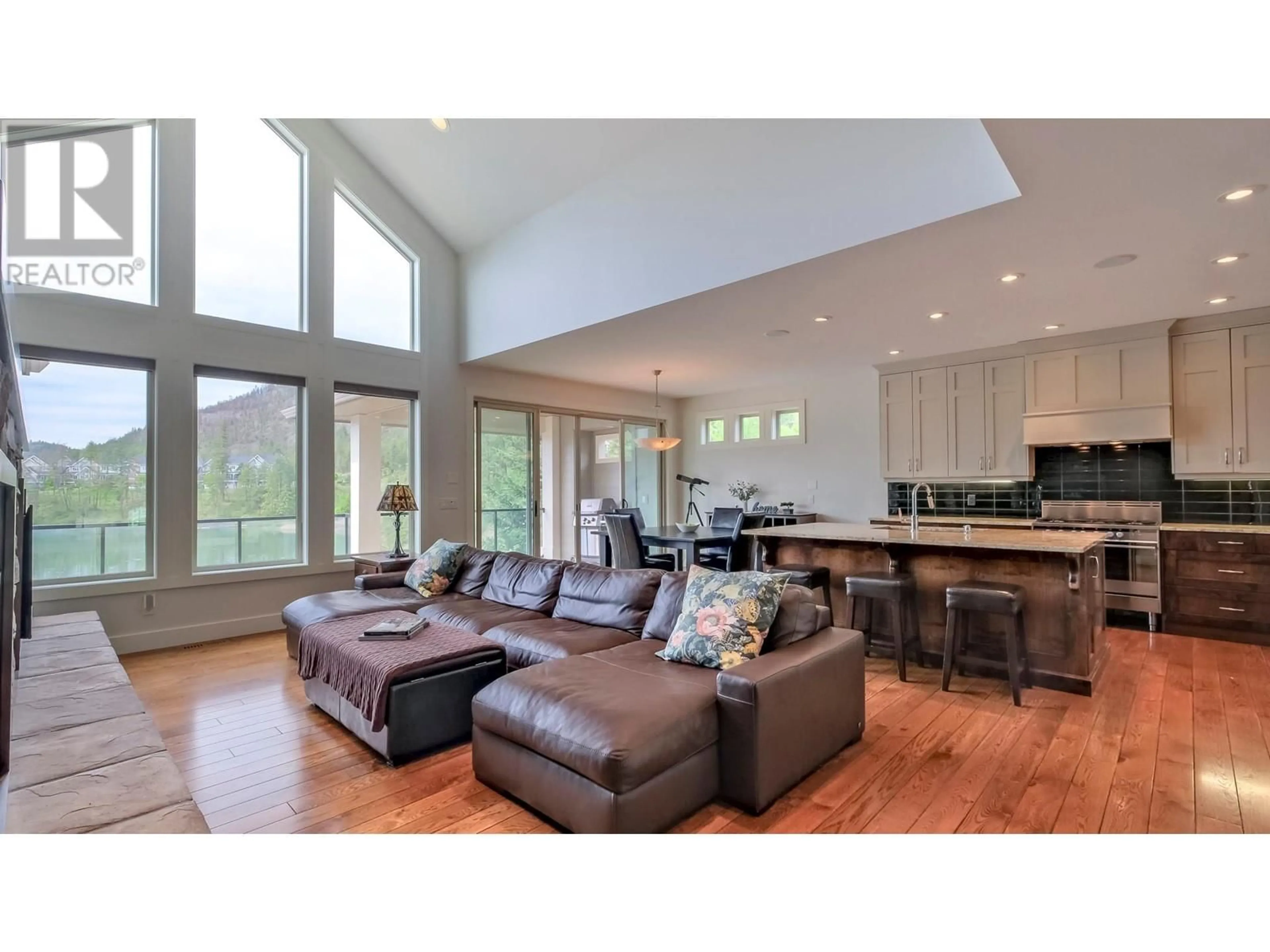 Open concept kitchen, wood/laminate floor for 1854 HIDDEN LAKE PLACE, Kelowna British Columbia V1V2W8