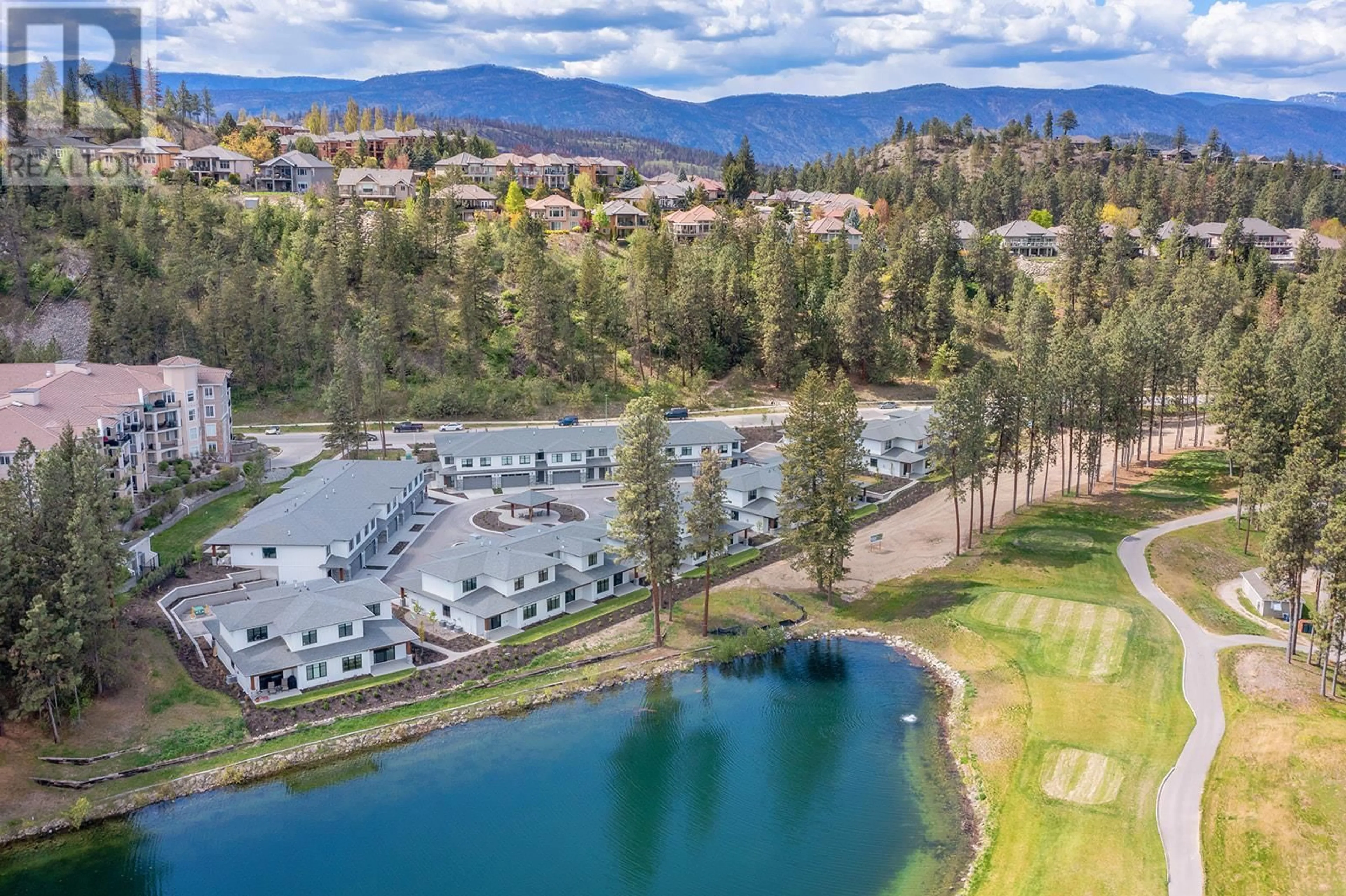 A pic from outside/outdoor area/front of a property/back of a property/a pic from drone, water/lake/river/ocean view for 11 - 1979 COUNTRY CLUB DRIVE, Kelowna British Columbia V1X0H6