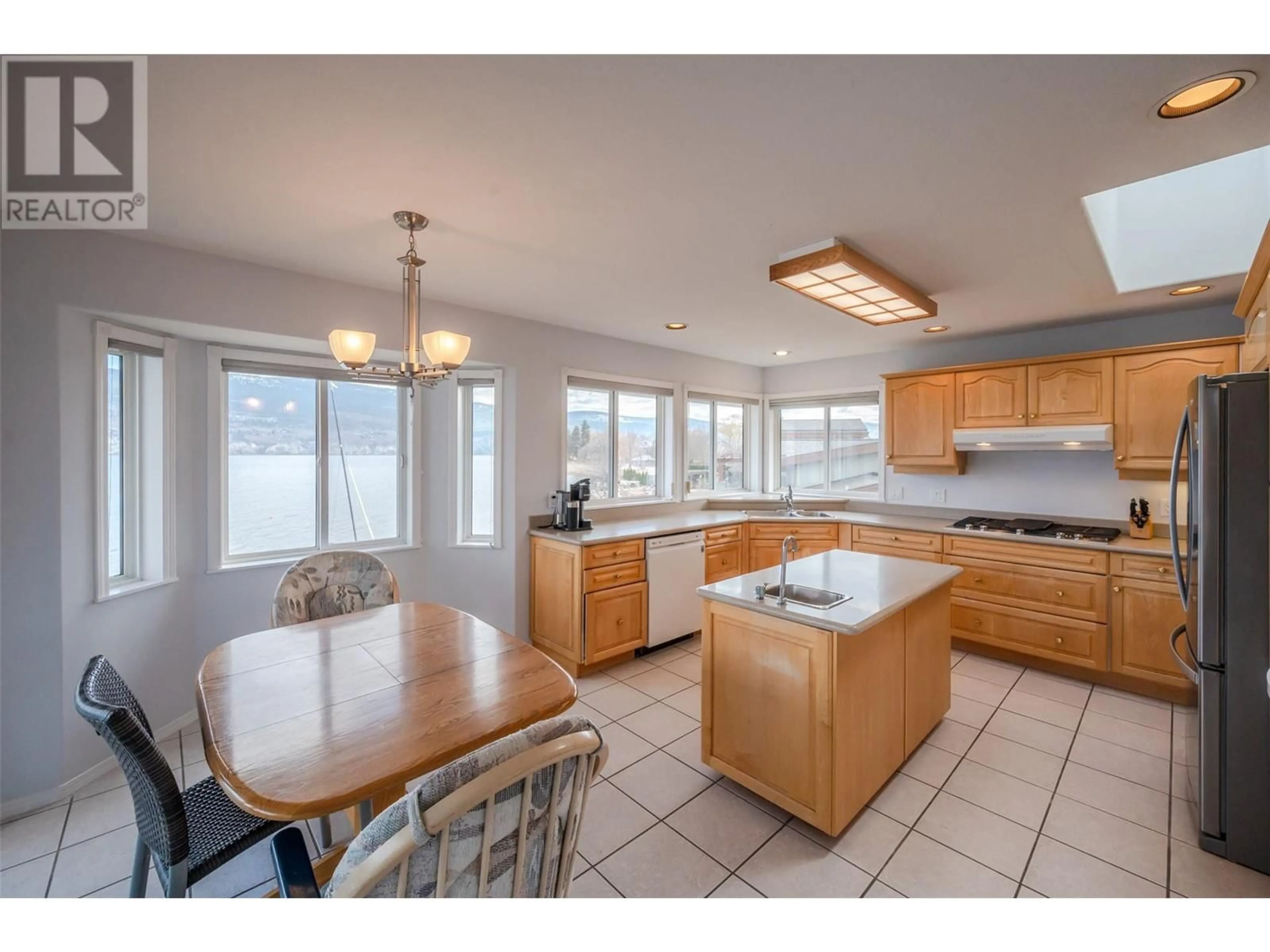 Open concept kitchen, unknown for 914 POWELL BEACH ROAD, Summerland British Columbia V0H1Z9