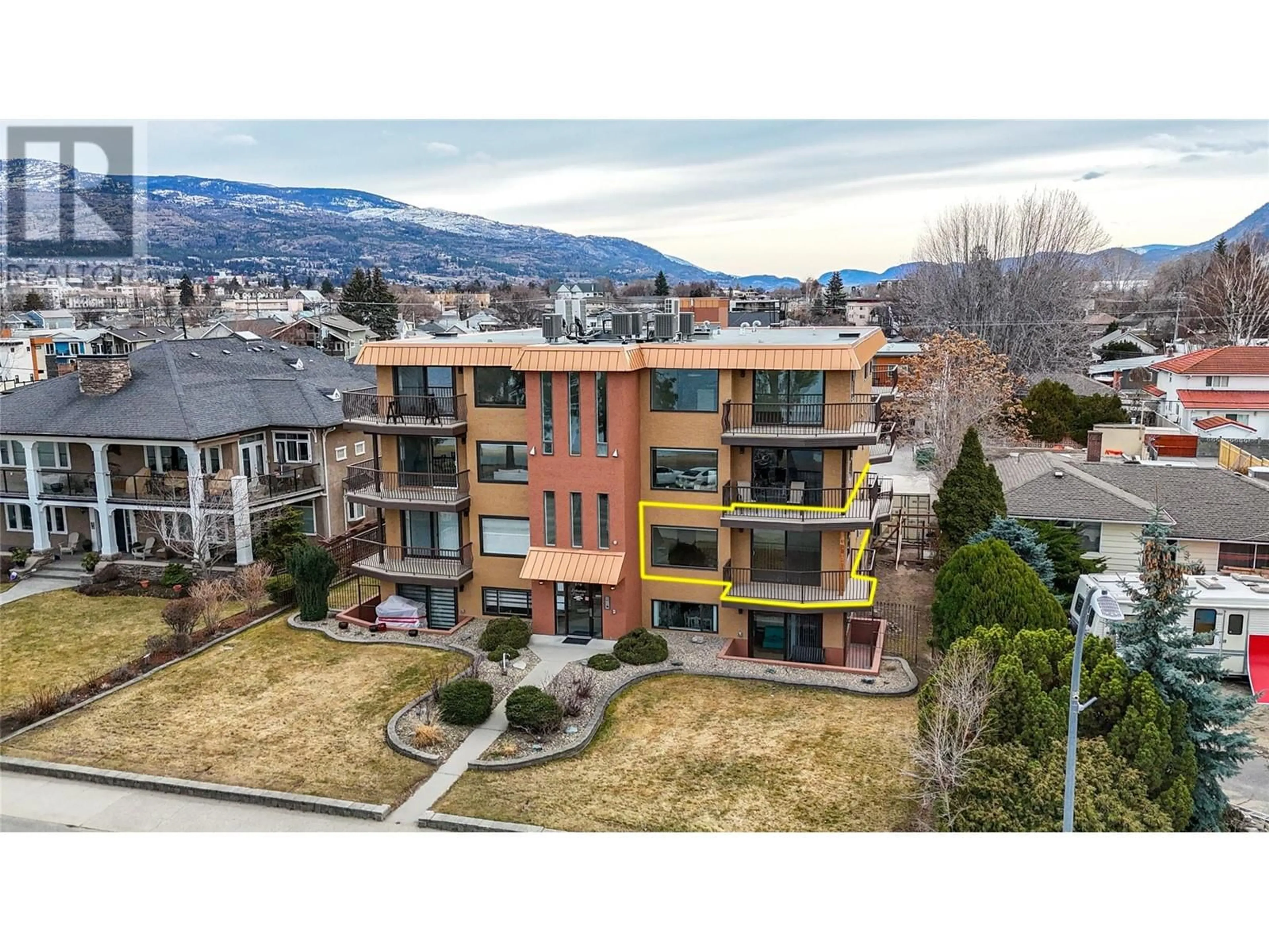 A pic from outside/outdoor area/front of a property/back of a property/a pic from drone, mountain view for 578 Lakeshore Drive Unit# 202, Penticton British Columbia V2A1B9