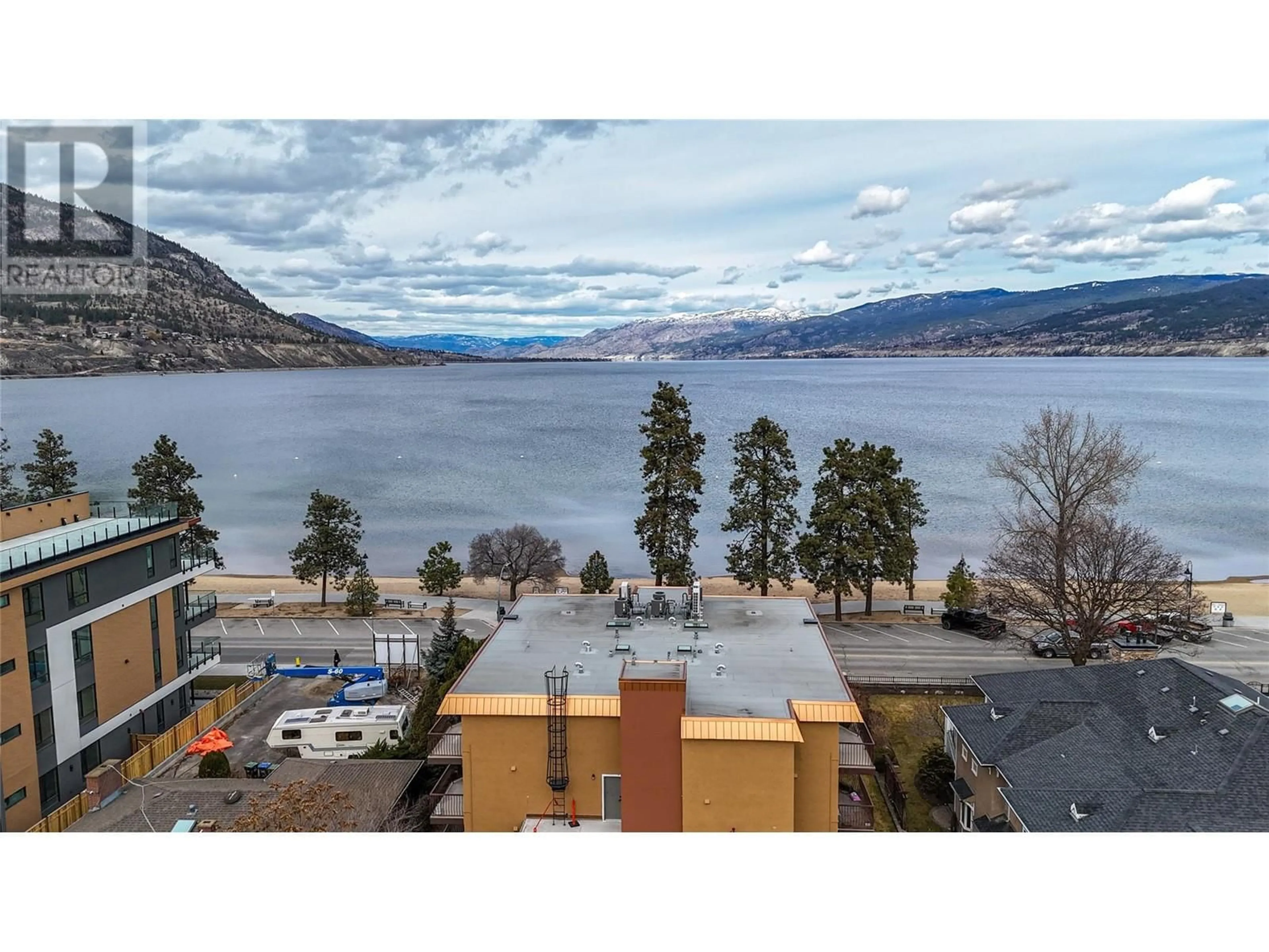 A pic from outside/outdoor area/front of a property/back of a property/a pic from drone, water/lake/river/ocean view for 578 Lakeshore Drive Unit# 202, Penticton British Columbia V2A1B9