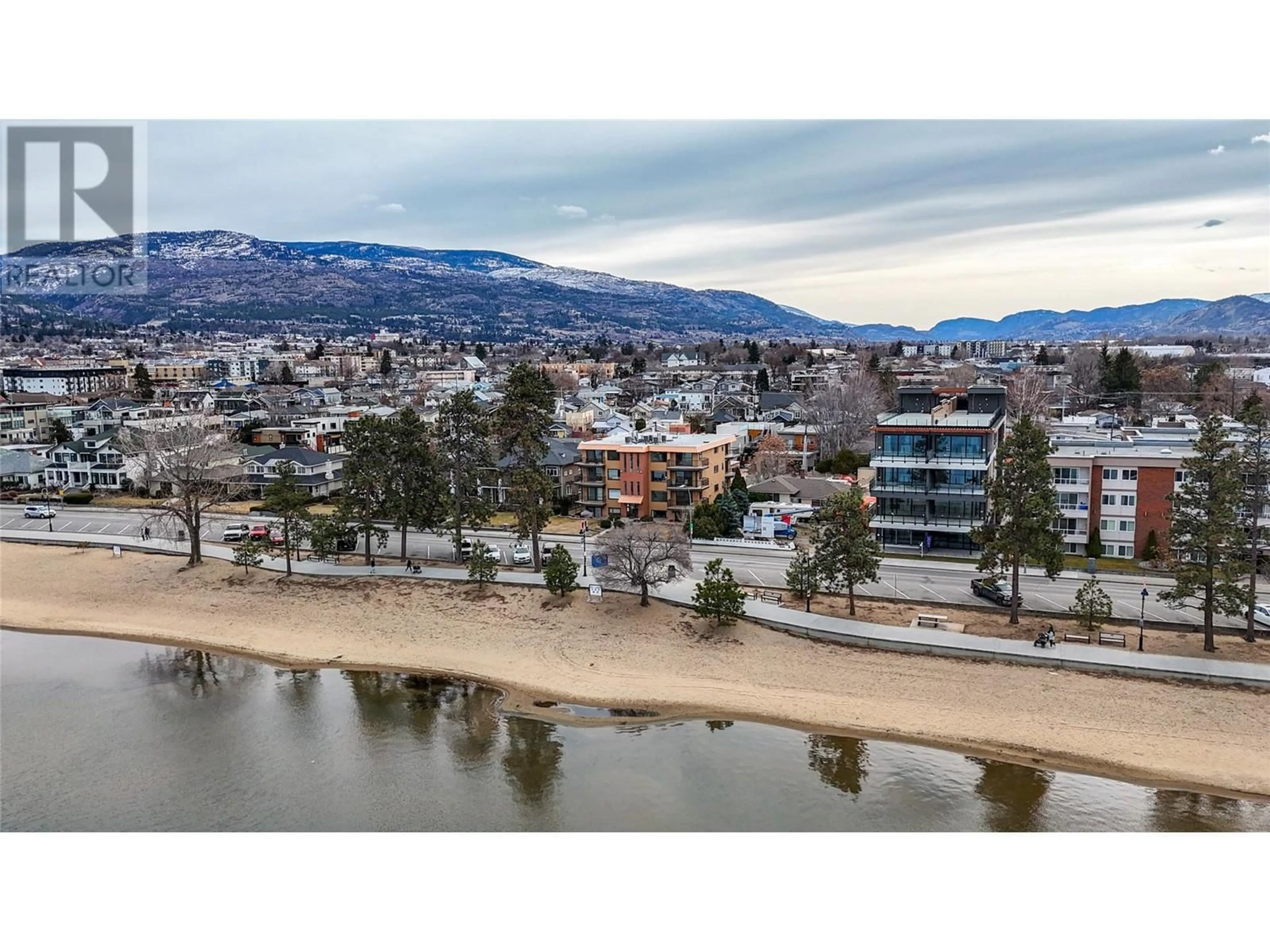 A pic from outside/outdoor area/front of a property/back of a property/a pic from drone, water/lake/river/ocean view for 578 Lakeshore Drive Unit# 202, Penticton British Columbia V2A1B9