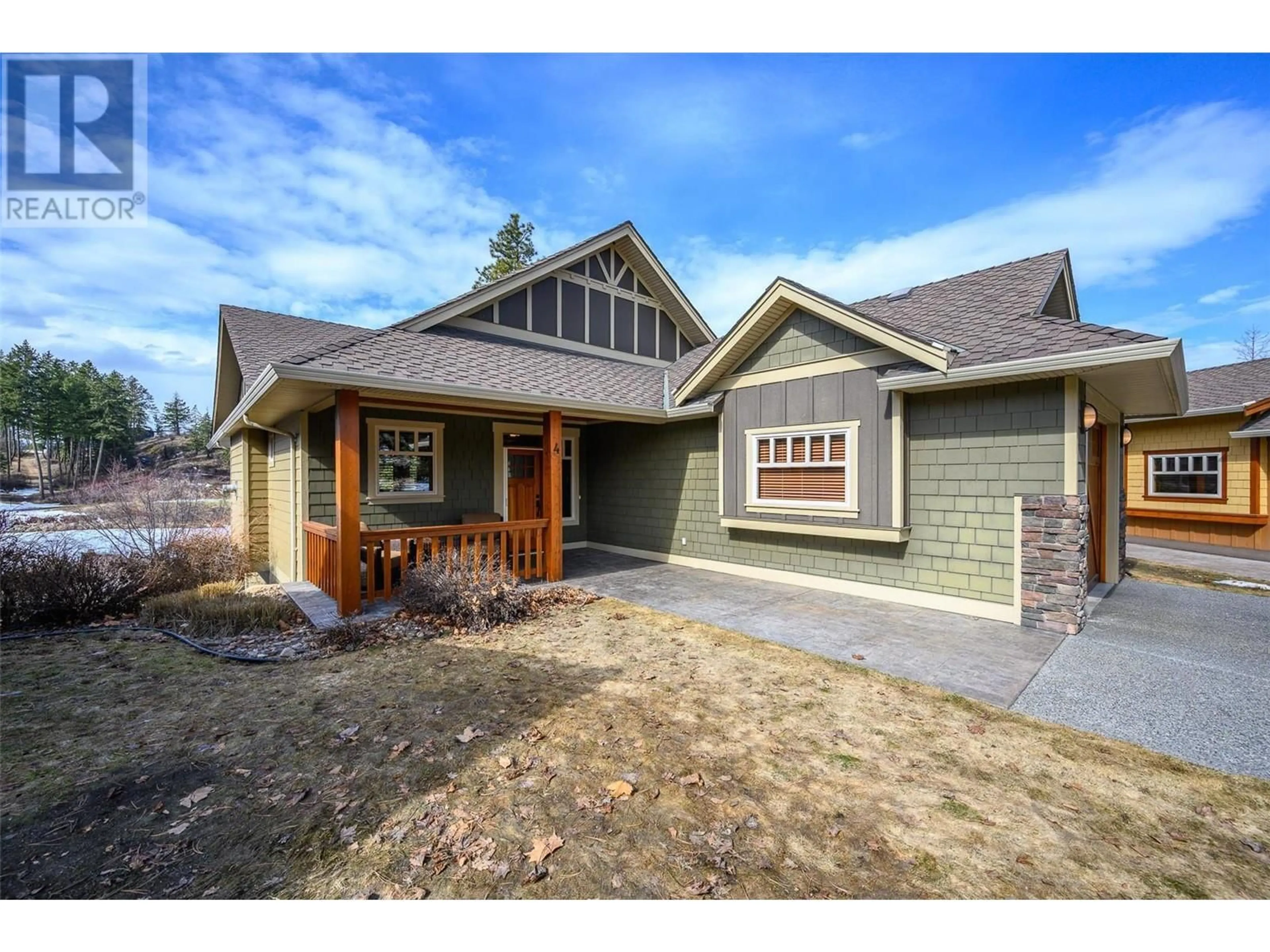 Home with vinyl exterior material, street for 4 - 27 BIRDIE LAKE DRIVE, Vernon British Columbia V1H2J4