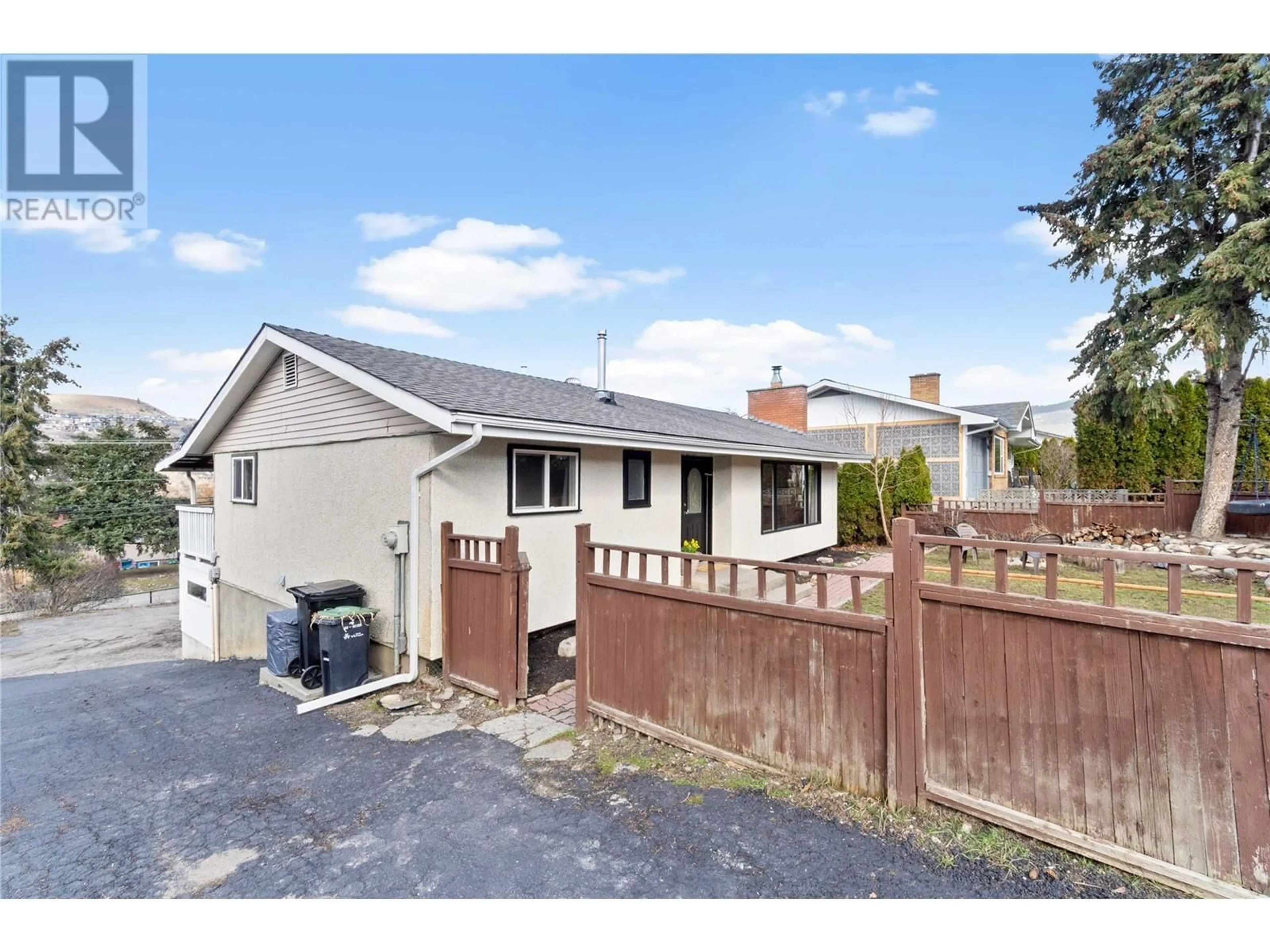 A pic from outside/outdoor area/front of a property/back of a property/a pic from drone, street for 3801 22 Avenue, Vernon British Columbia V1T1H7