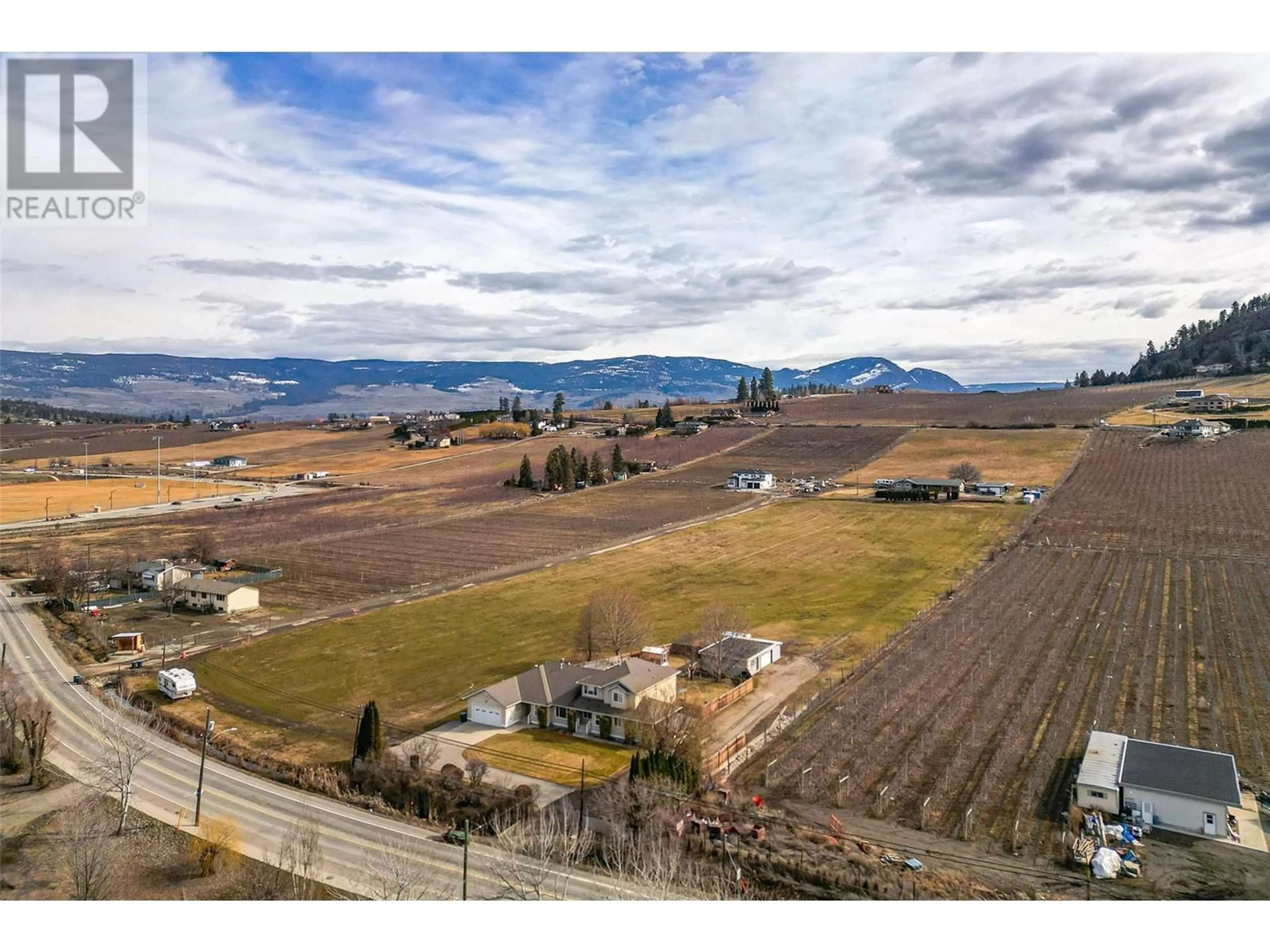 A pic from outside/outdoor area/front of a property/back of a property/a pic from drone, mountain view for 1-3 - 371 VALLEY ROAD, Kelowna British Columbia V1V2E5