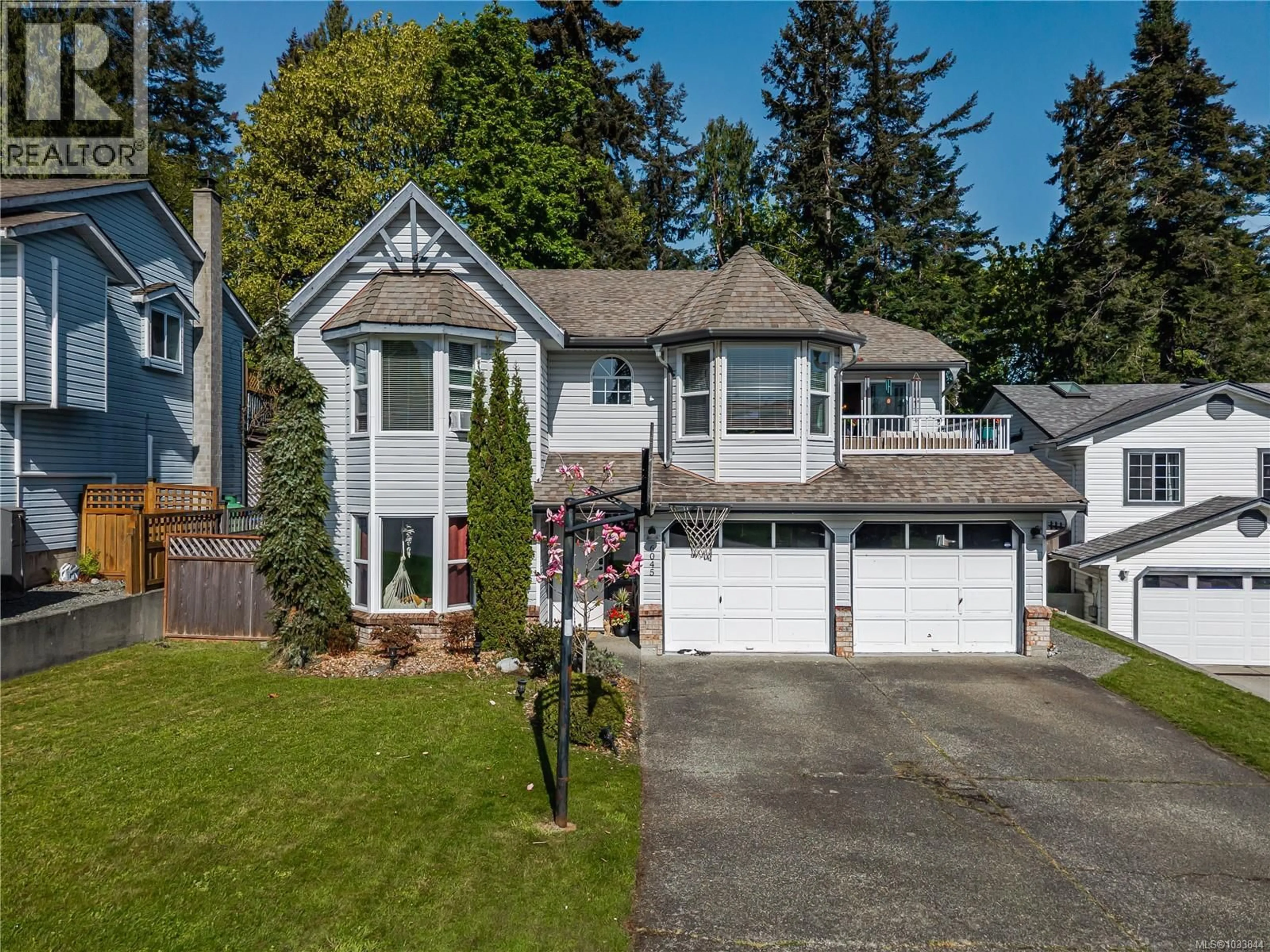 Home with vinyl exterior material, street for 6045 DRIFTWOOD PLACE, Nanaimo British Columbia V9V1G2