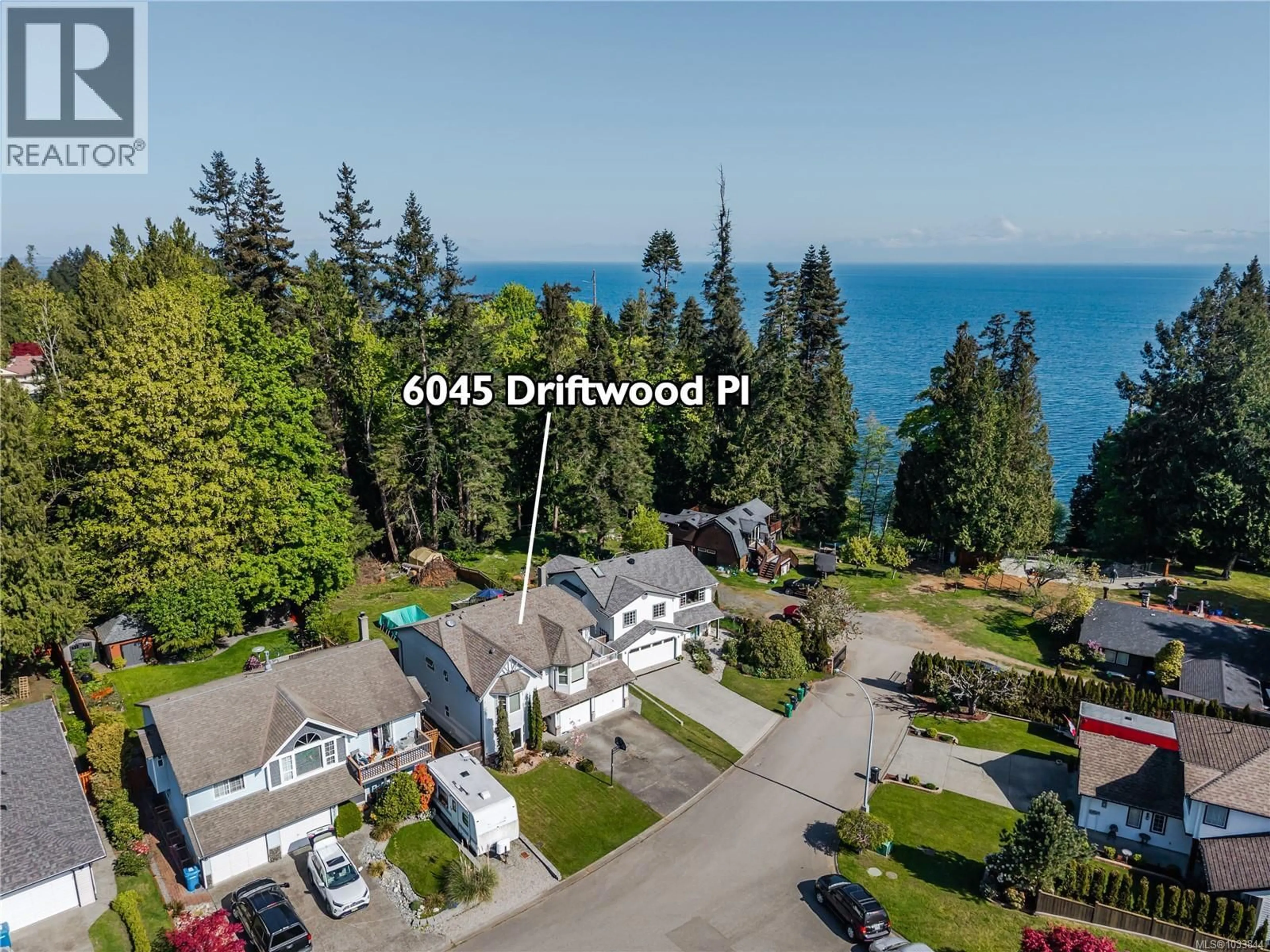 A pic from outside/outdoor area/front of a property/back of a property/a pic from drone, water/lake/river/ocean view for 6045 DRIFTWOOD PLACE, Nanaimo British Columbia V9V1G2