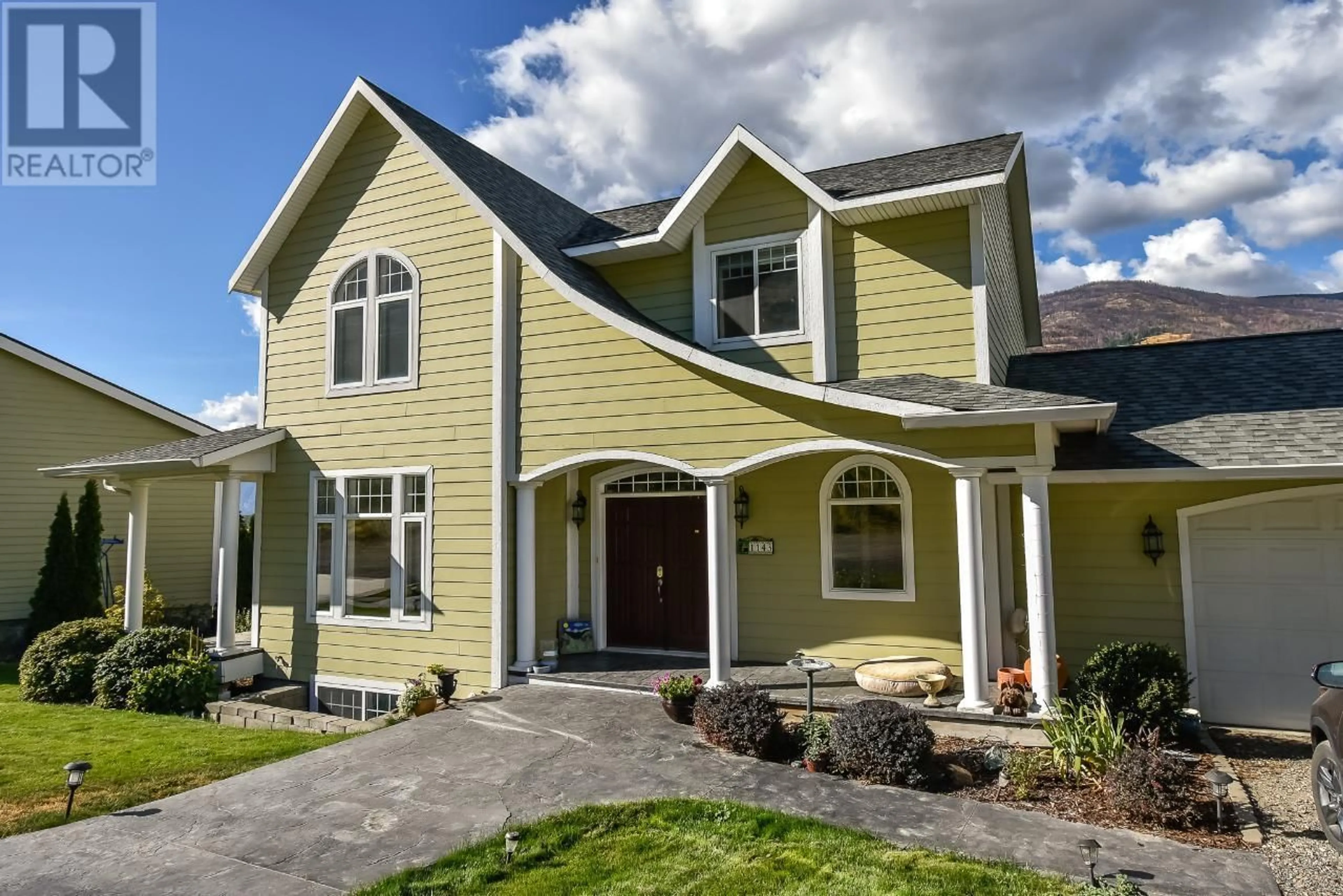 Home with vinyl exterior material, street for 1143 HWY 3 OTHER, Cawston British Columbia V0X1C3