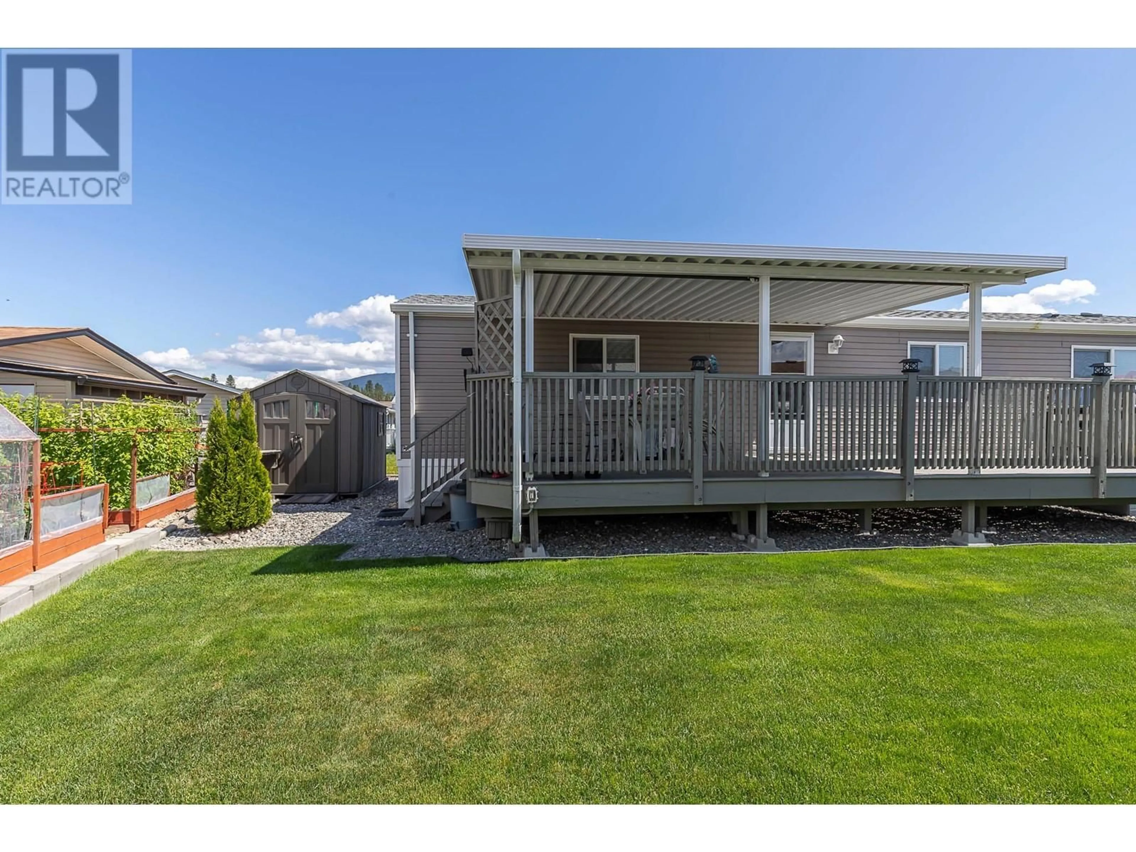 A pic from outside/outdoor area/front of a property/back of a property/a pic from drone, unknown for 74 - 12560 WESTSIDE ROAD, Vernon British Columbia V1H1S9