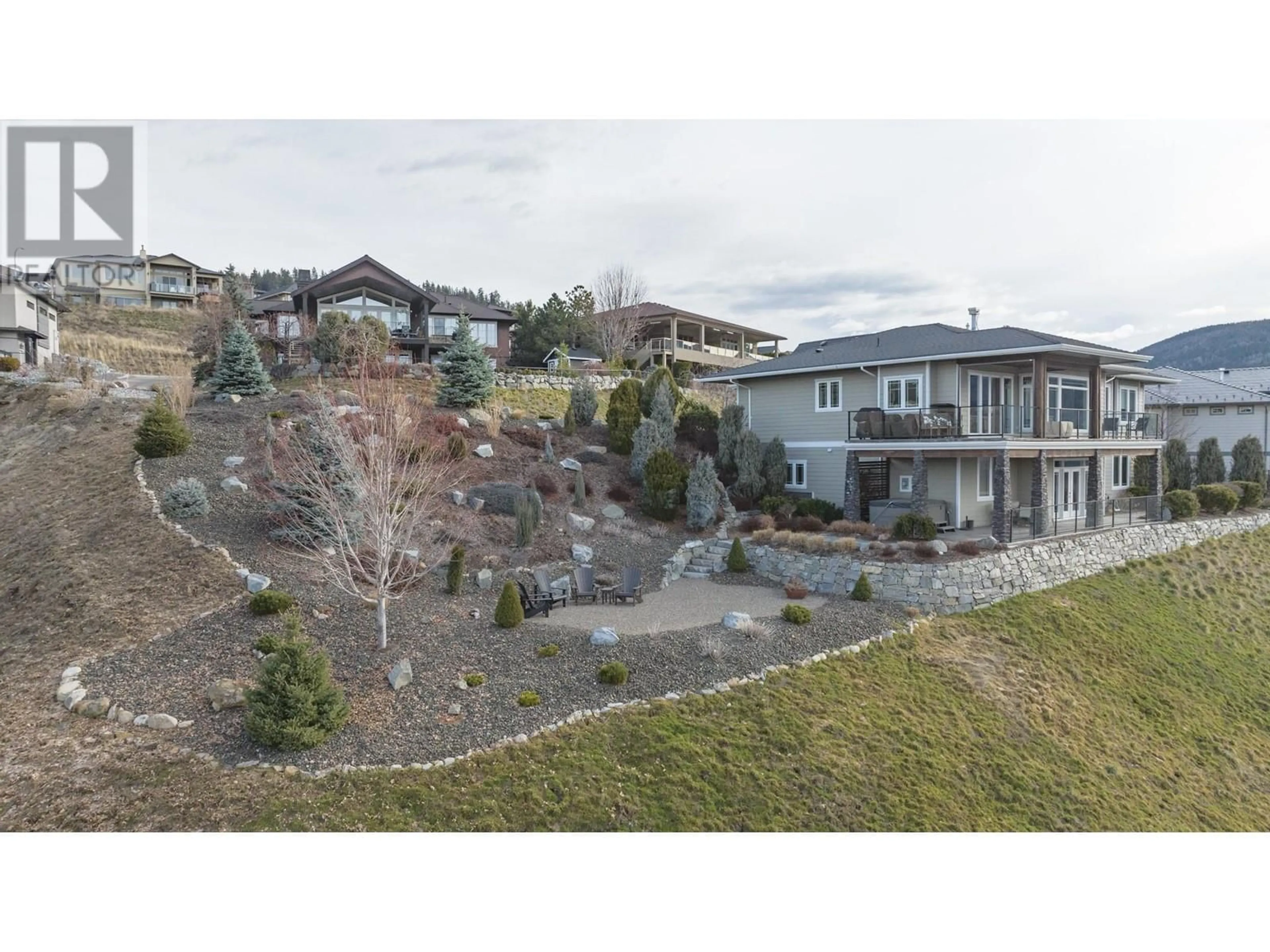 A pic from outside/outdoor area/front of a property/back of a property/a pic from drone, mountain view for 733 Hart Lane, Vernon British Columbia V1B4B2