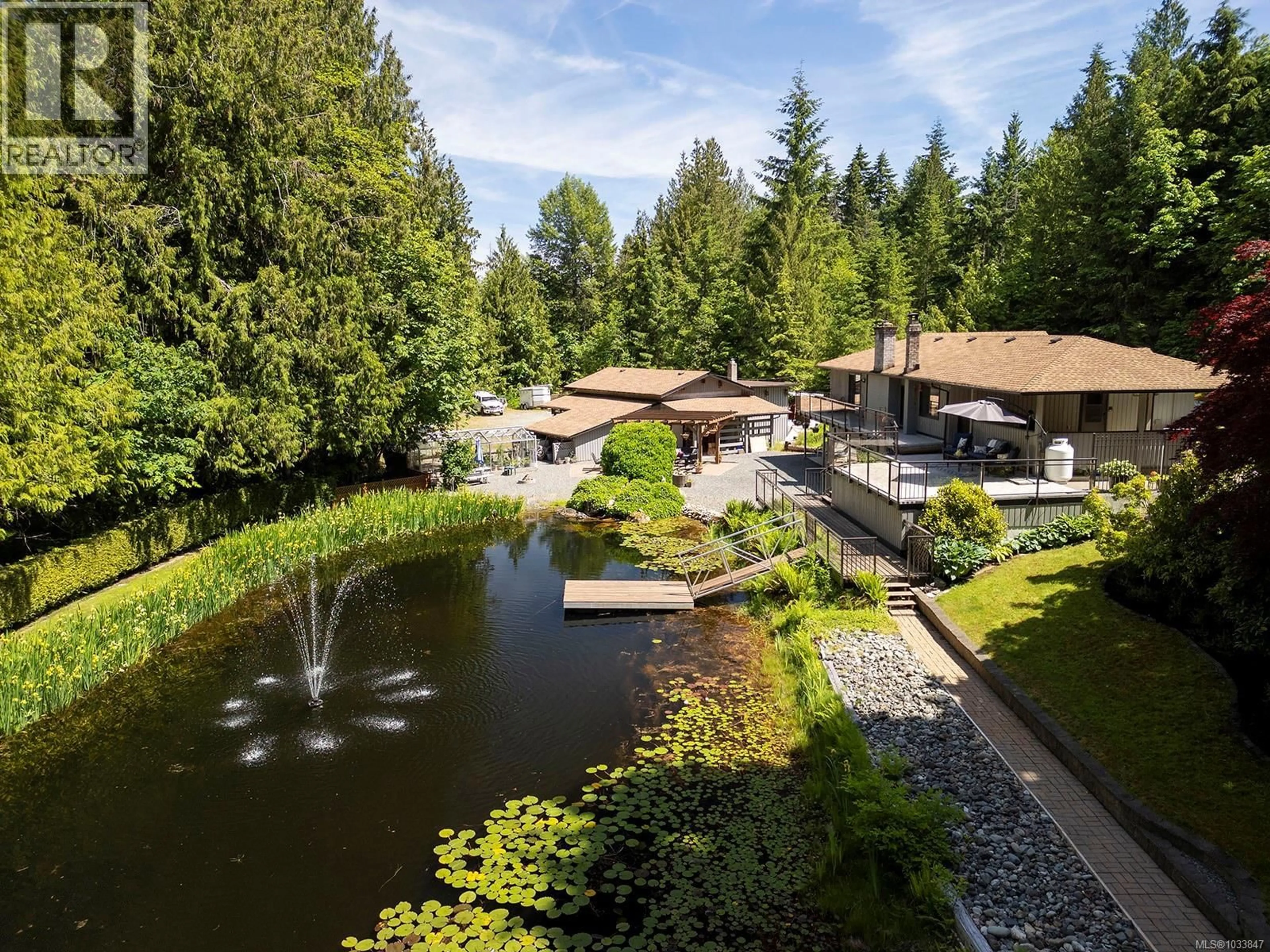 A pic from outside/outdoor area/front of a property/back of a property/a pic from drone, water/lake/river/ocean view for 970 MCLEAN ROAD, Coombs British Columbia V9K1Y3
