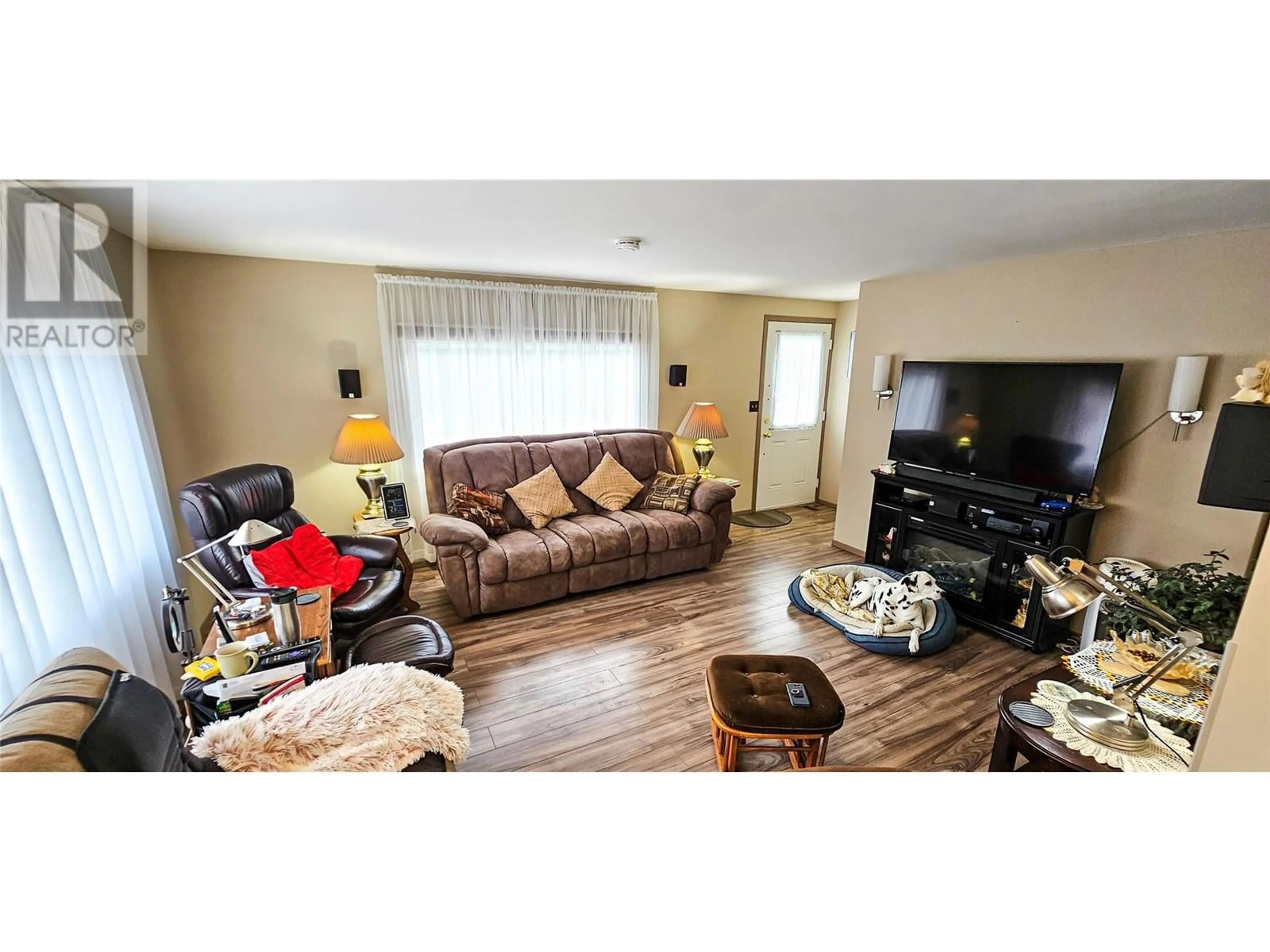 Living room with furniture, wood/laminate floor for 3705 KAHN ROAD, Cranbrook British Columbia V1C6S8