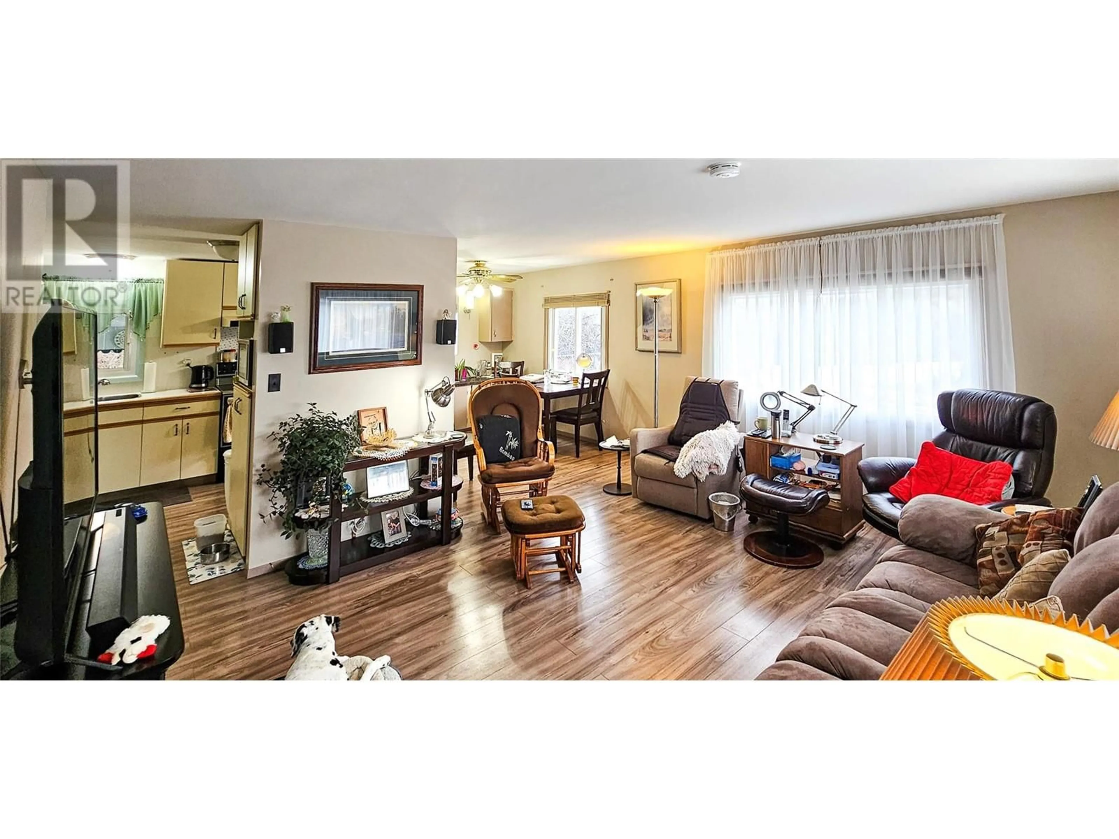 Living room with furniture, wood/laminate floor for 3705 KAHN ROAD, Cranbrook British Columbia V1C6S8