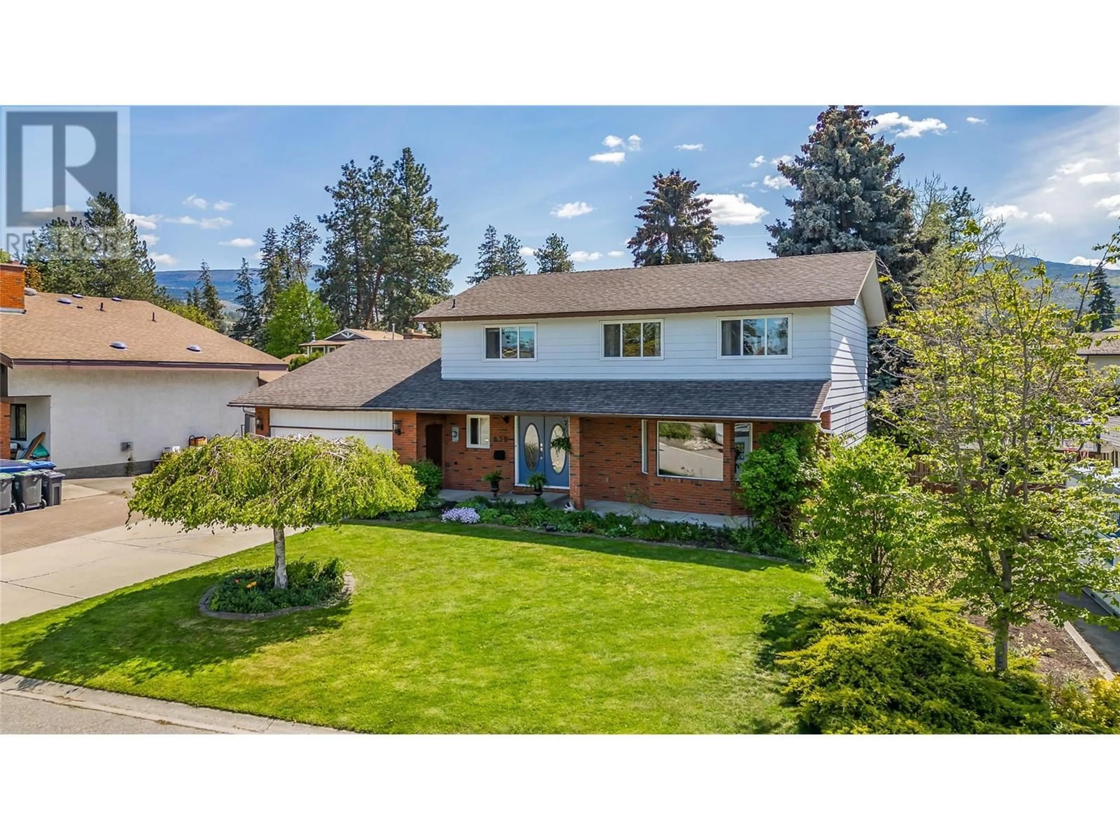 A pic from outside/outdoor area/front of a property/back of a property/a pic from drone, street for 639 TOMBY COURT, Kelowna British Columbia V1W2K9
