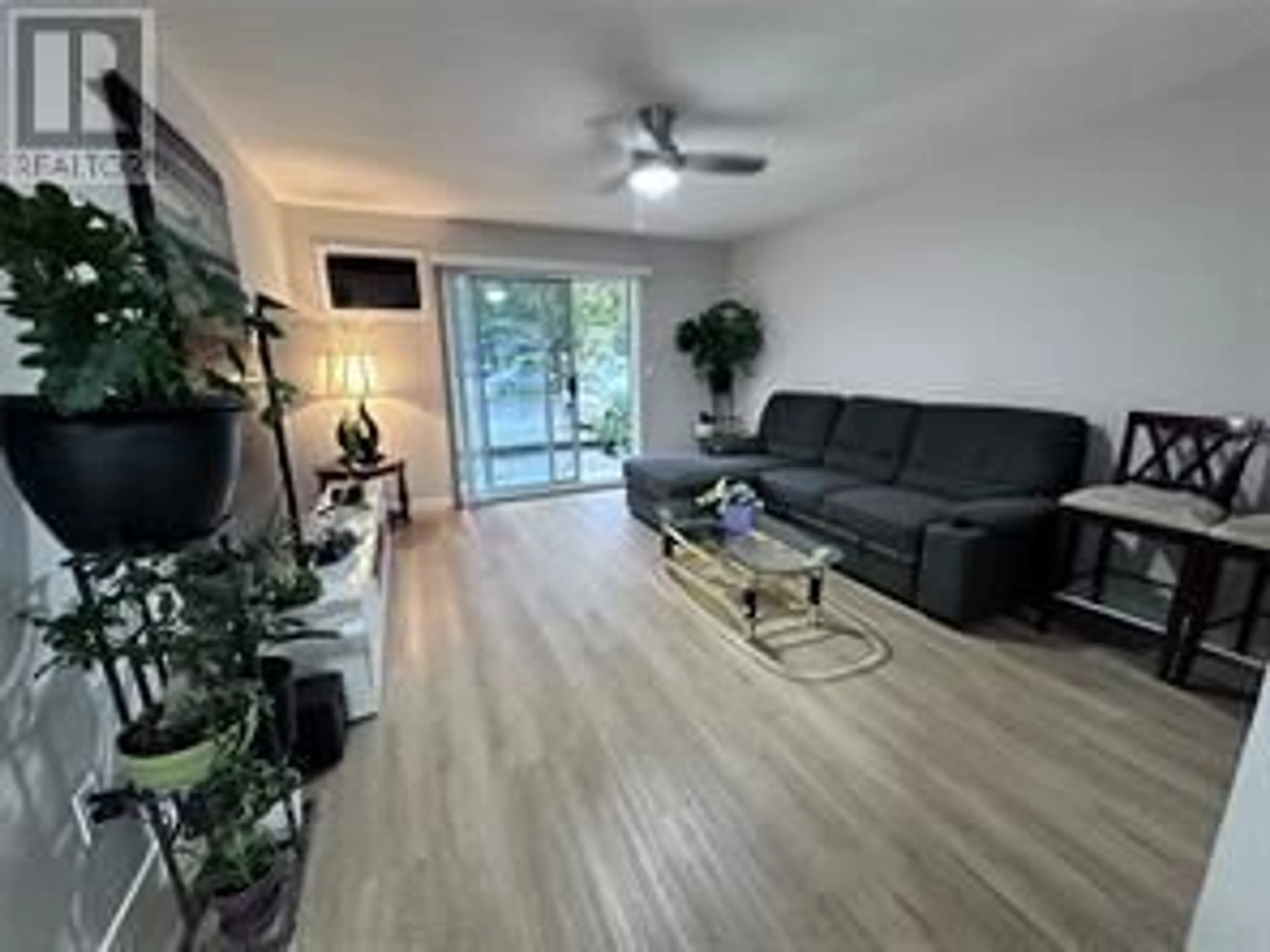 Living room with furniture, unknown for 108 - 3180 DE MONTREUIL COURT, Kelowna British Columbia V1W3W4
