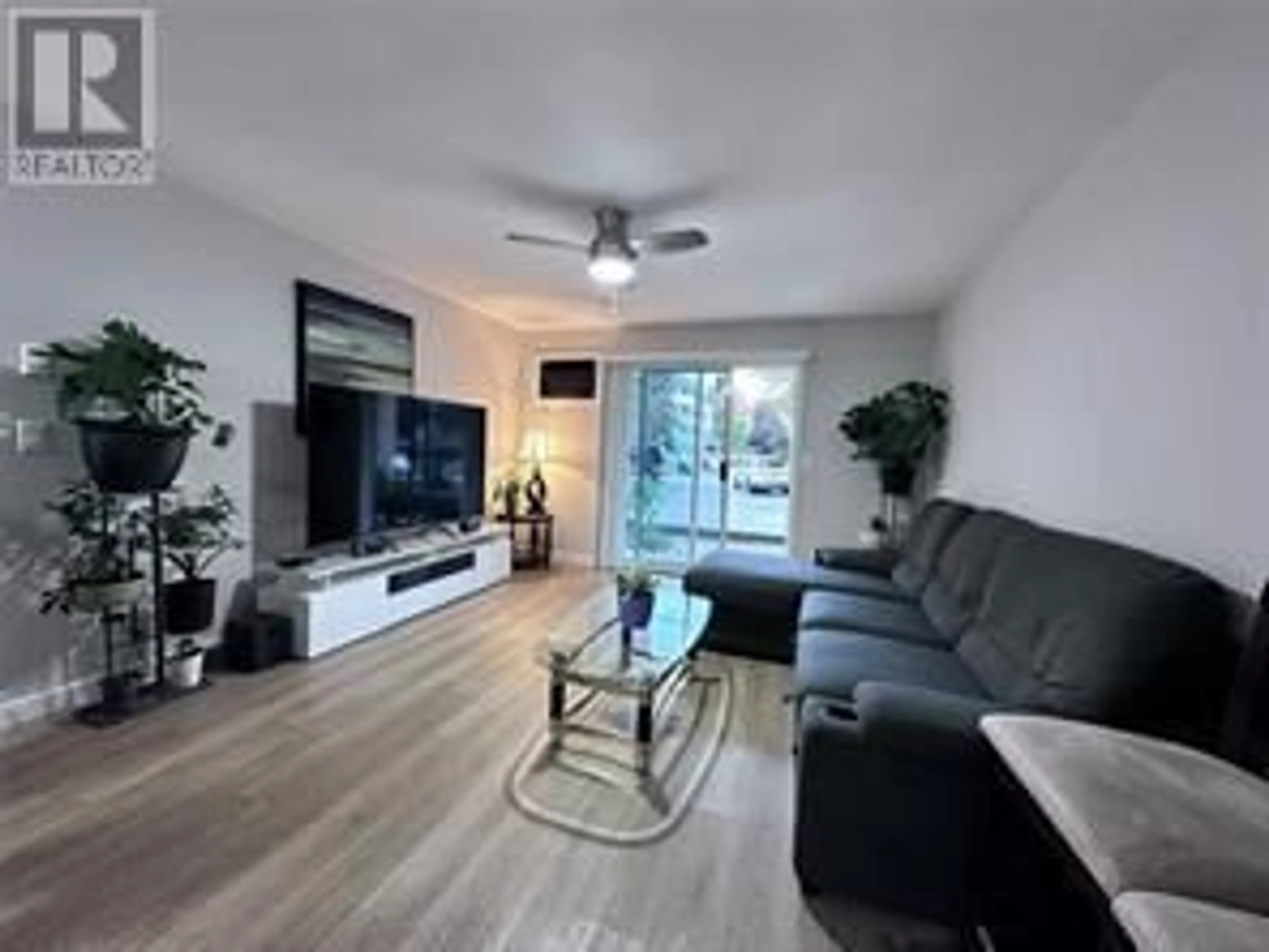 Living room with furniture, unknown for 108 - 3180 DE MONTREUIL COURT, Kelowna British Columbia V1W3W4