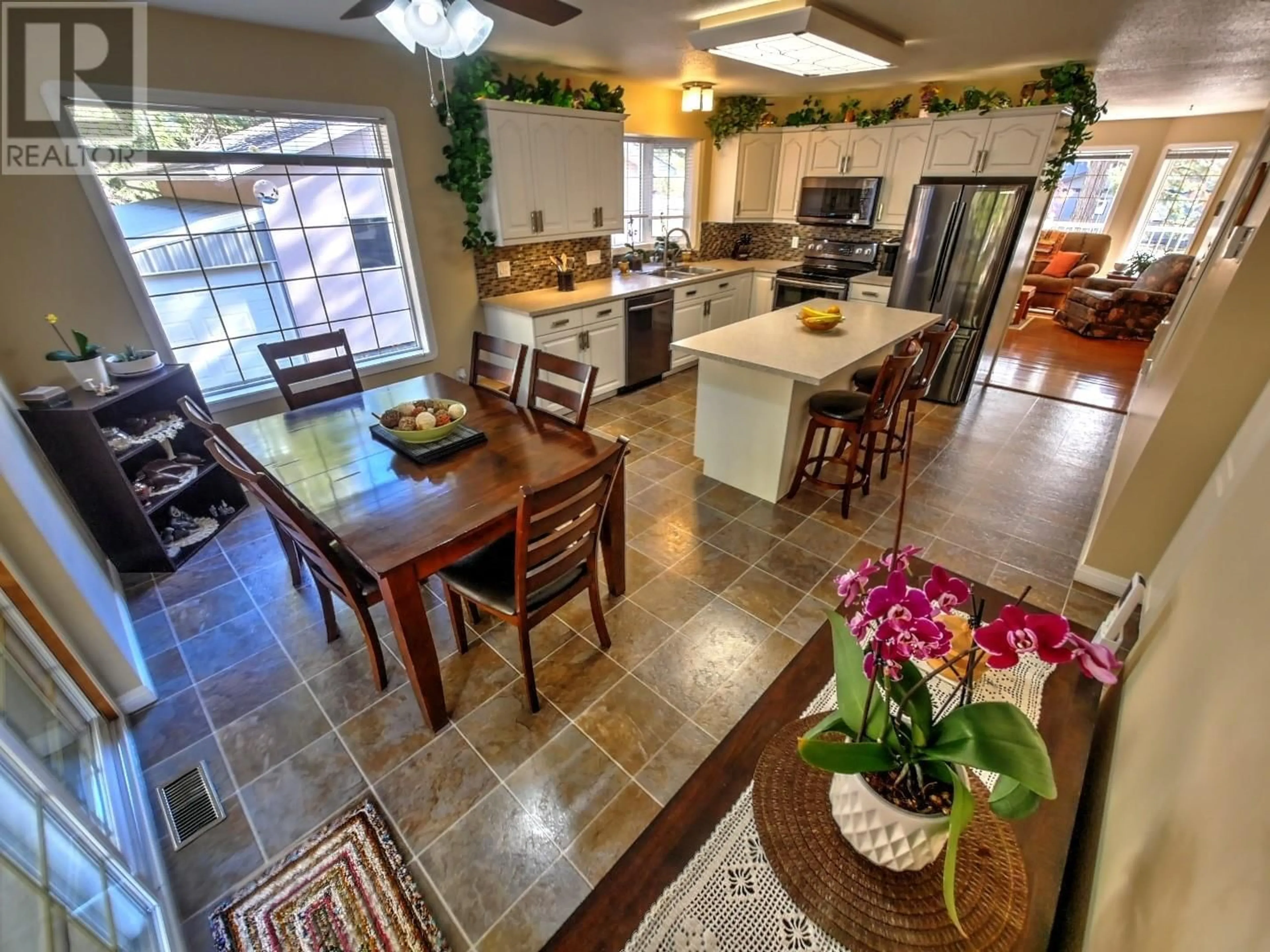 Open concept kitchen, ceramic/tile floor for 1910 Leaning Tree Road, Lister British Columbia V0B1G2