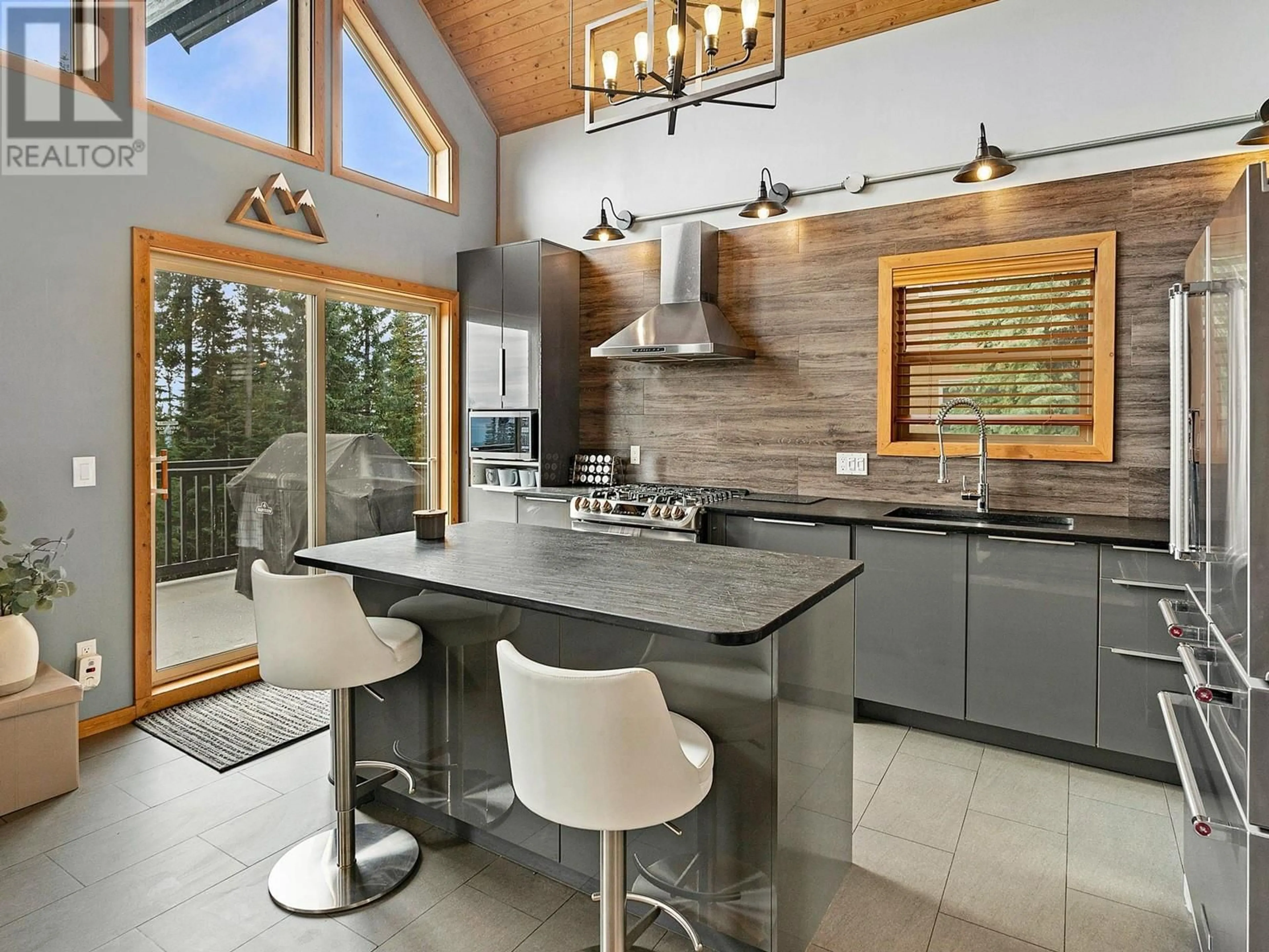 Contemporary kitchen, ceramic/tile floor for 4833 SNOWPINES ROAD, Big White British Columbia V1P1T4