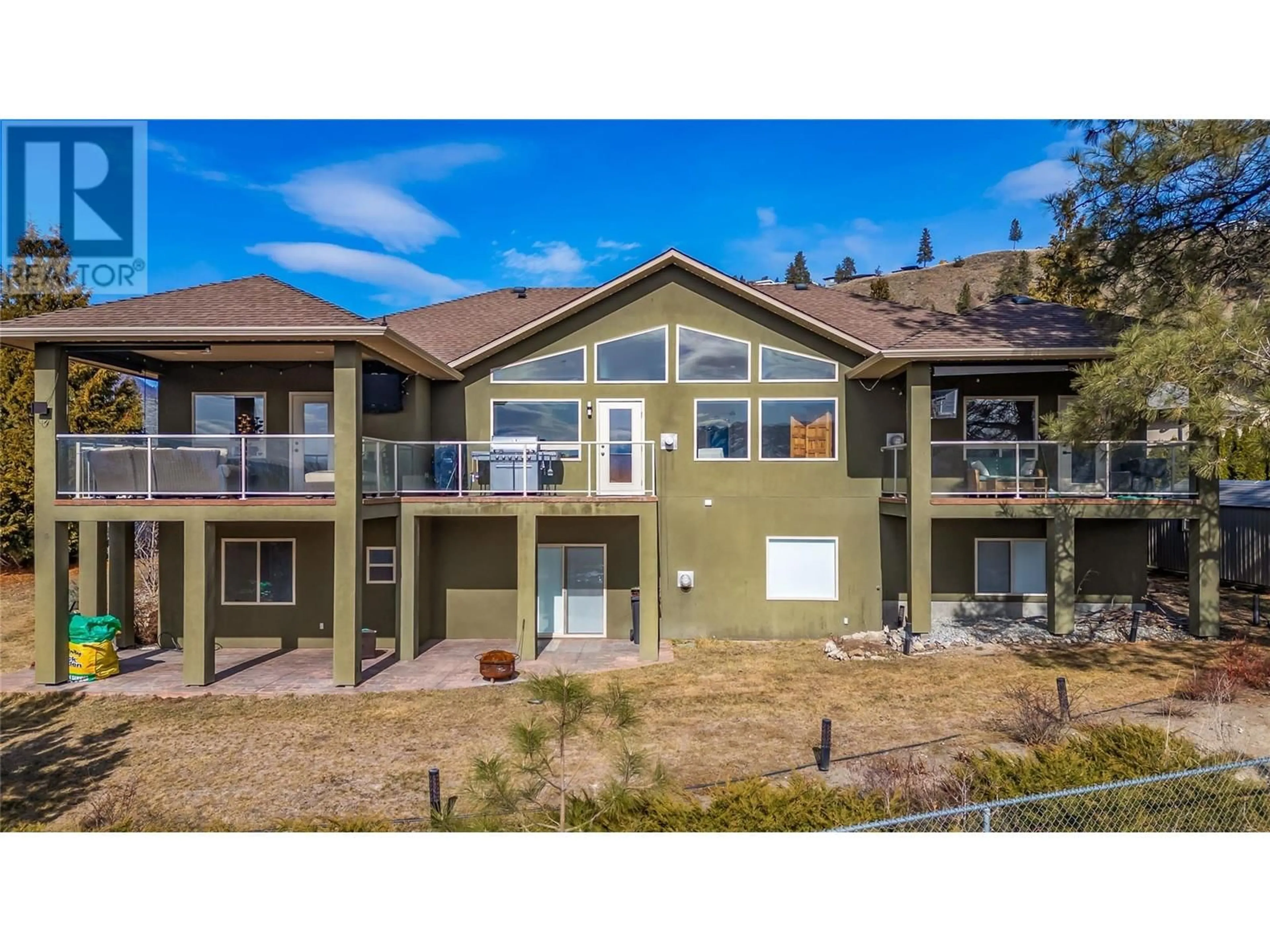 A pic from outside/outdoor area/front of a property/back of a property/a pic from drone, water/lake/river/ocean view for 3356 MERLOT COURT, West Kelowna British Columbia V4T2W7
