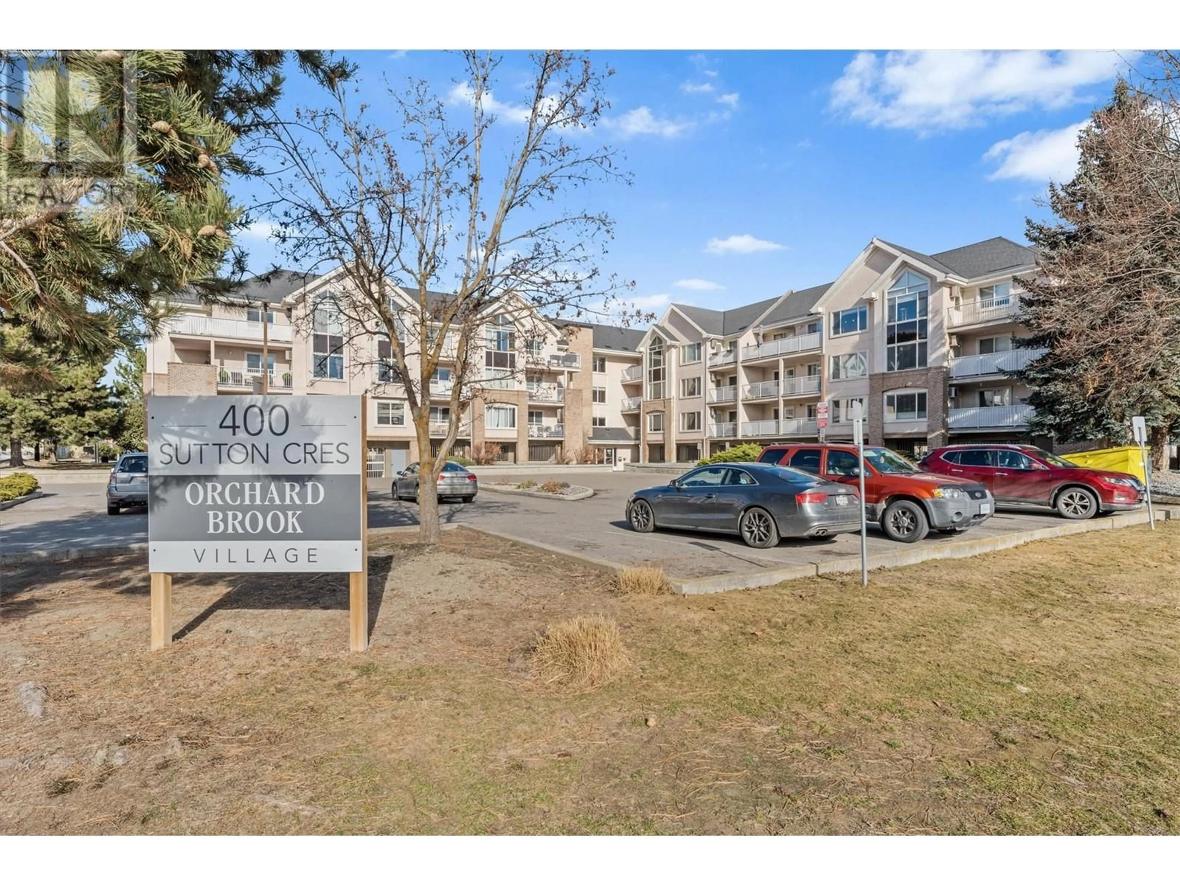 A pic from outside/outdoor area/front of a property/back of a property/a pic from drone, mountain view for 400 Sutton Crescent Unit# 205, Kelowna British Columbia V1V2A5