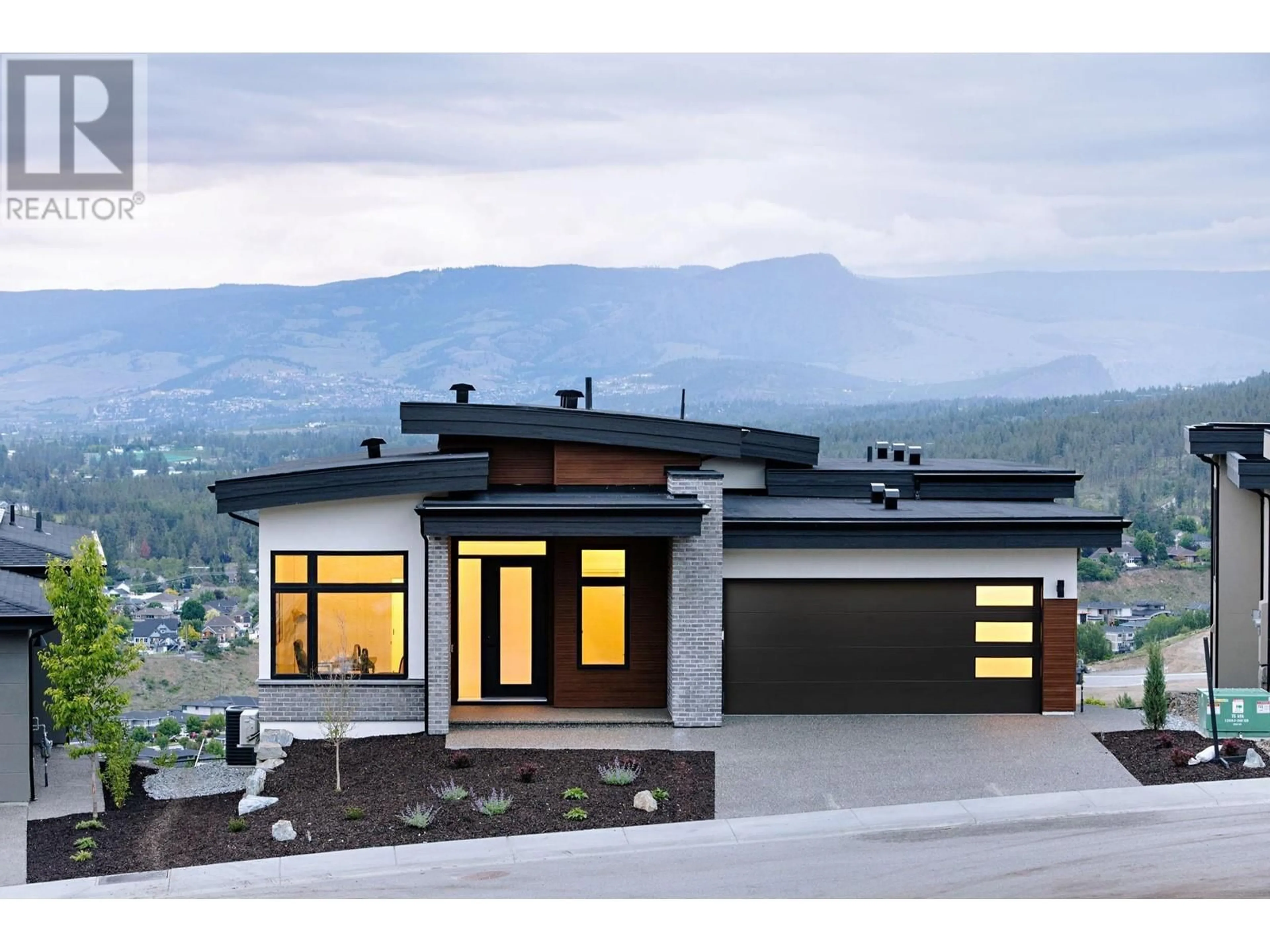 Home with vinyl exterior material, mountain view for 1050 EMSLIE STREET, Kelowna British Columbia V1W0C3