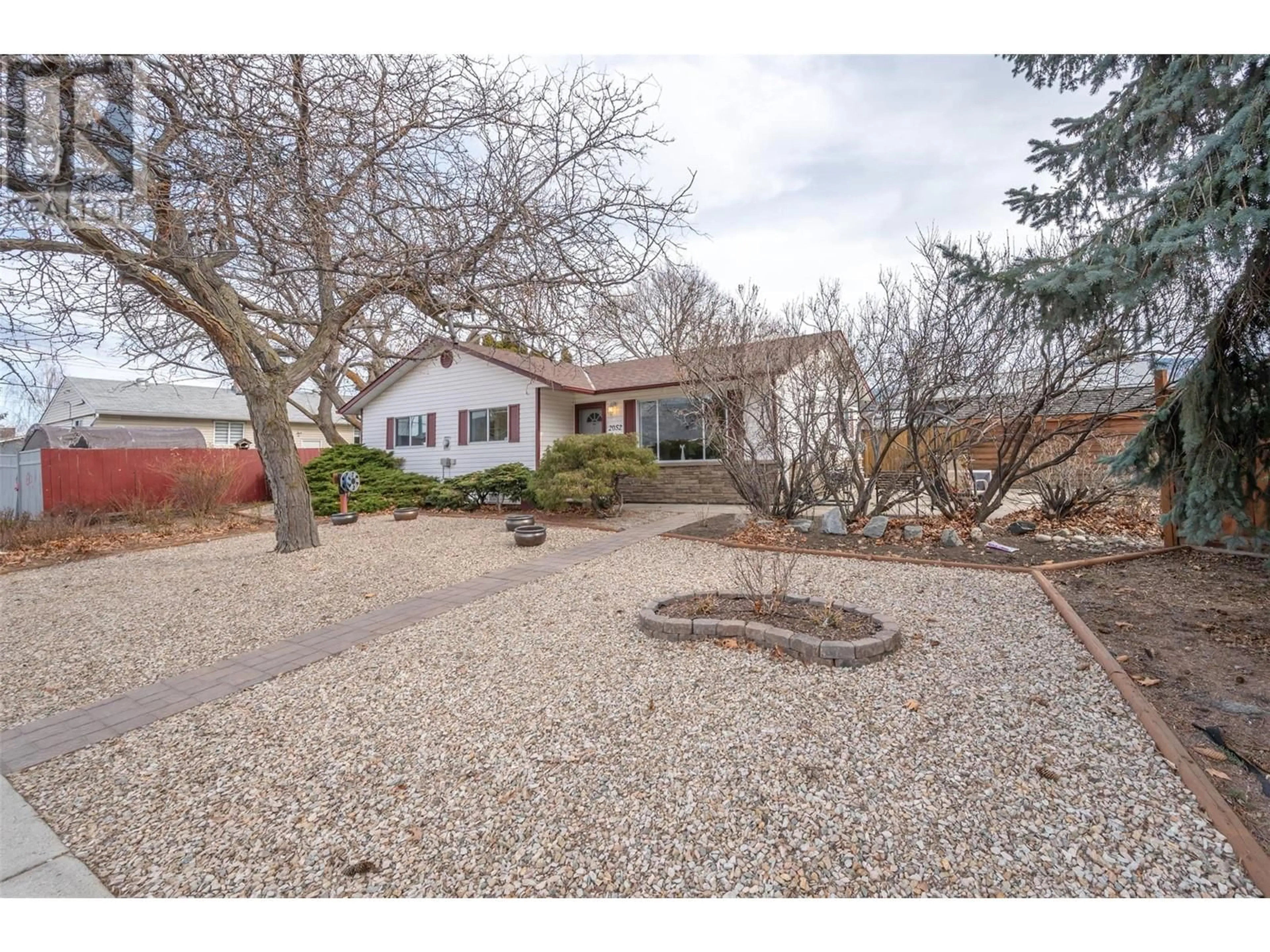 A pic from outside/outdoor area/front of a property/back of a property/a pic from drone, street for 2052 Atkinson Street, Penticton British Columbia V2A8H5