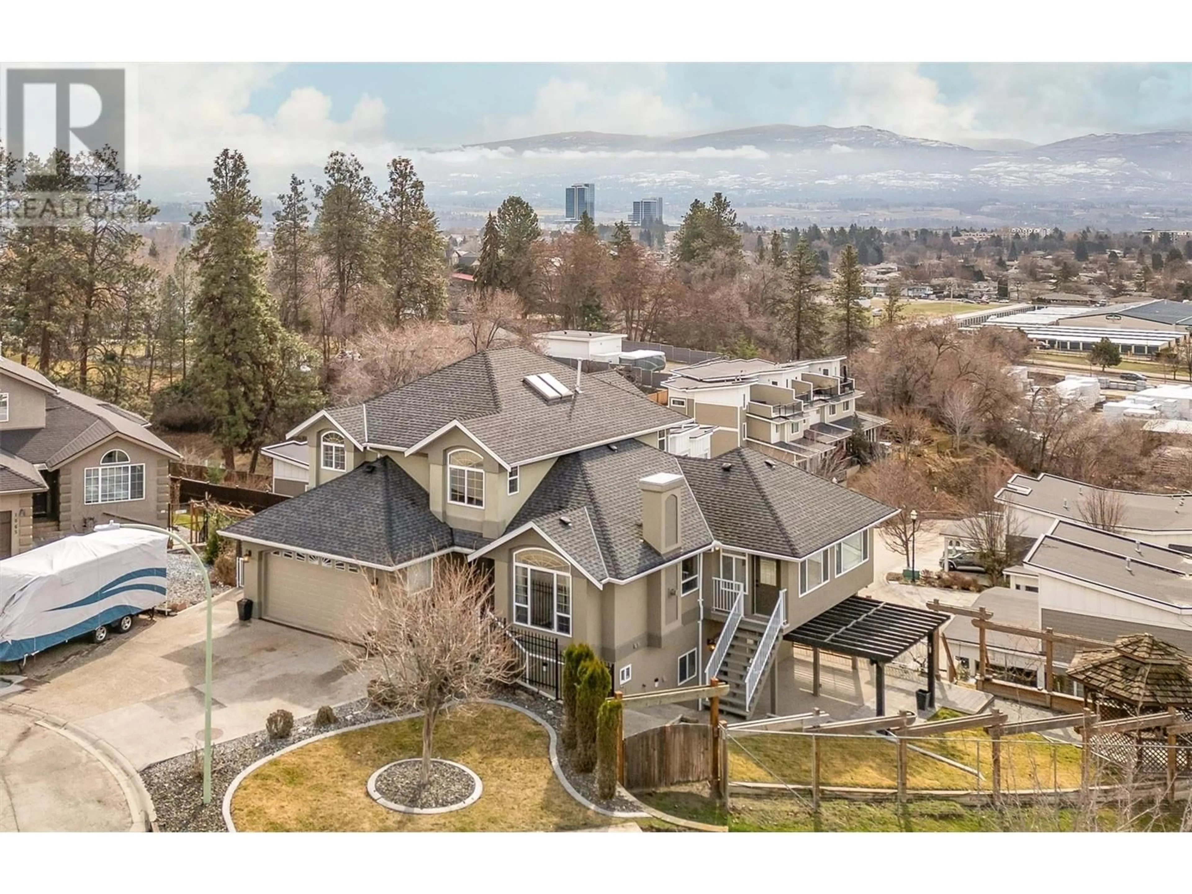 A pic from outside/outdoor area/front of a property/back of a property/a pic from drone, mountain view for 1075 Waldie Court Lot# D, Kelowna British Columbia V1Y9P8