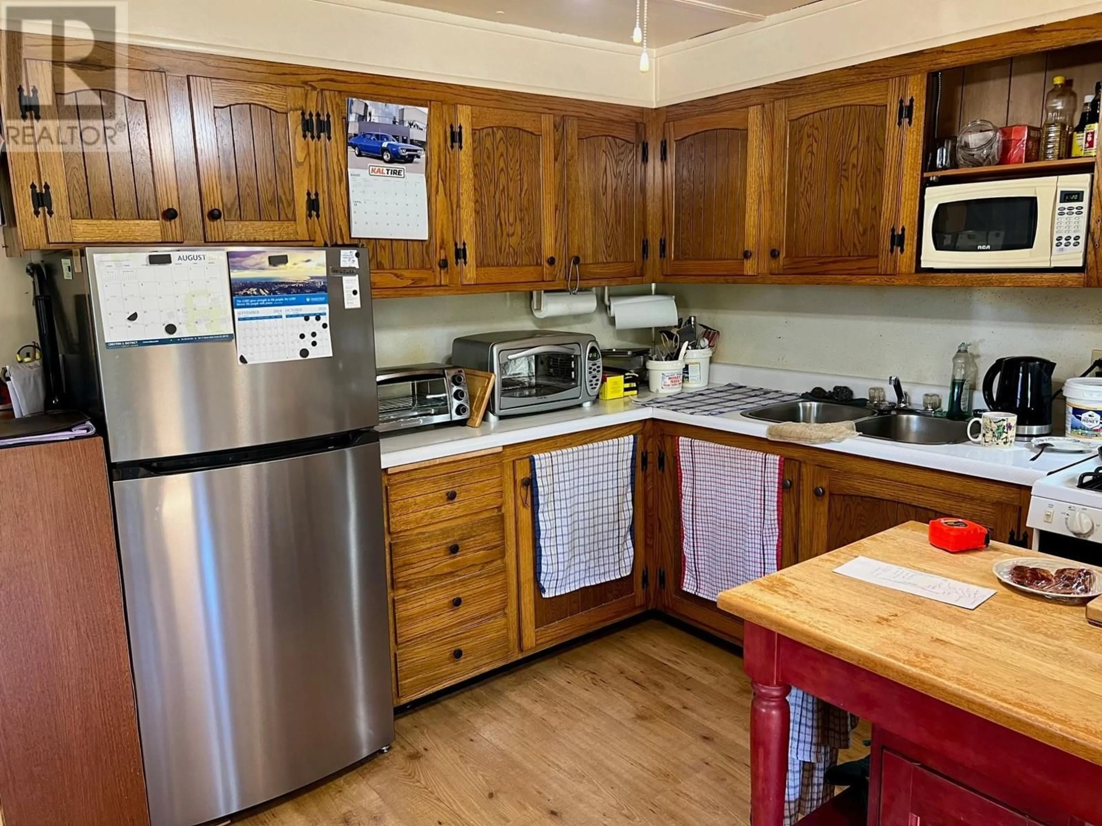 Standard kitchen, wood/laminate floor for 11 - 3003 3 HIGHWAY, Erickson British Columbia V0B1G1