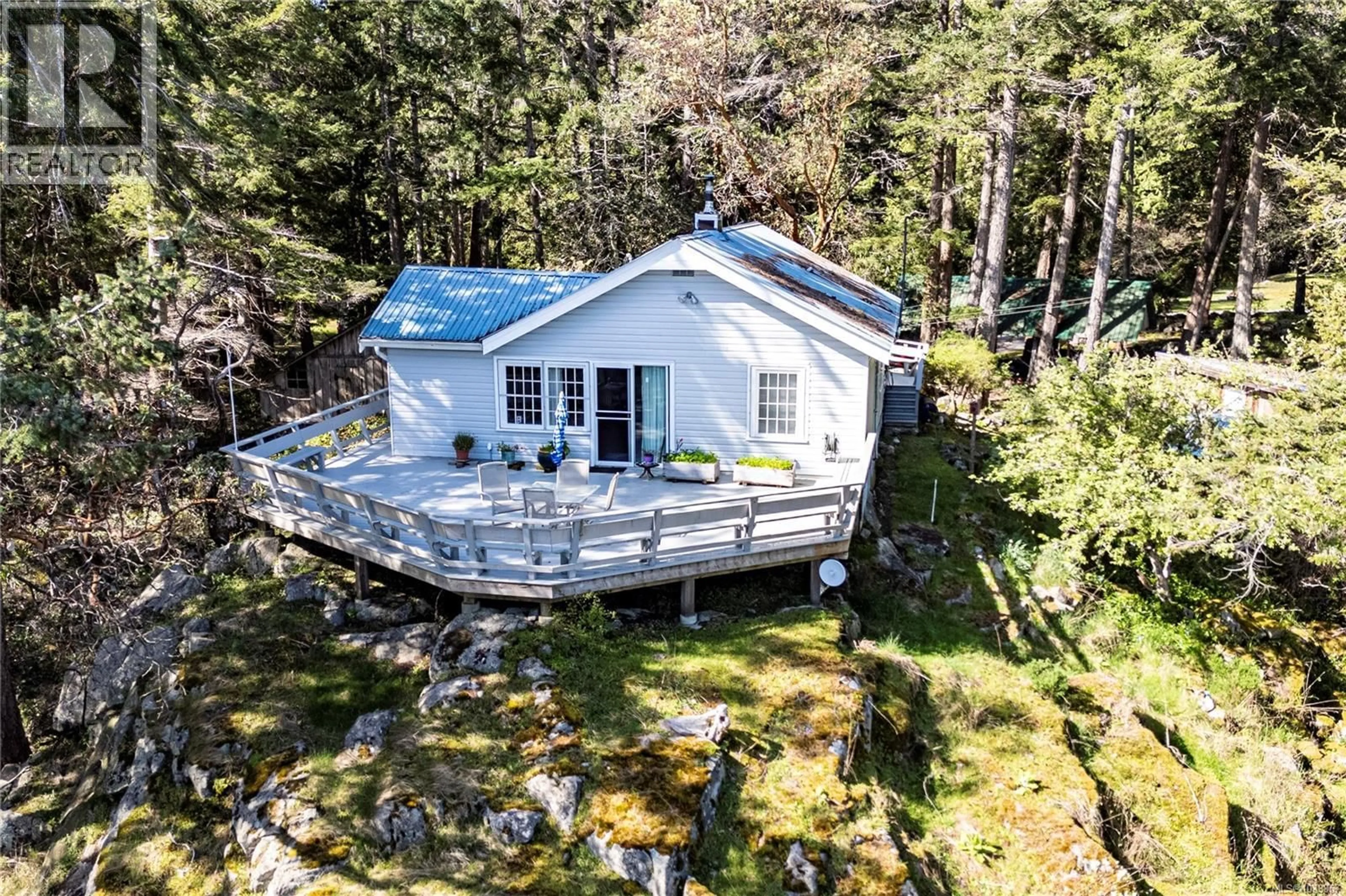 A pic from outside/outdoor area/front of a property/back of a property/a pic from drone, water/lake/river/ocean view for 1410 RED GRANITE ROAD, Cortes Island British Columbia V0P1K0