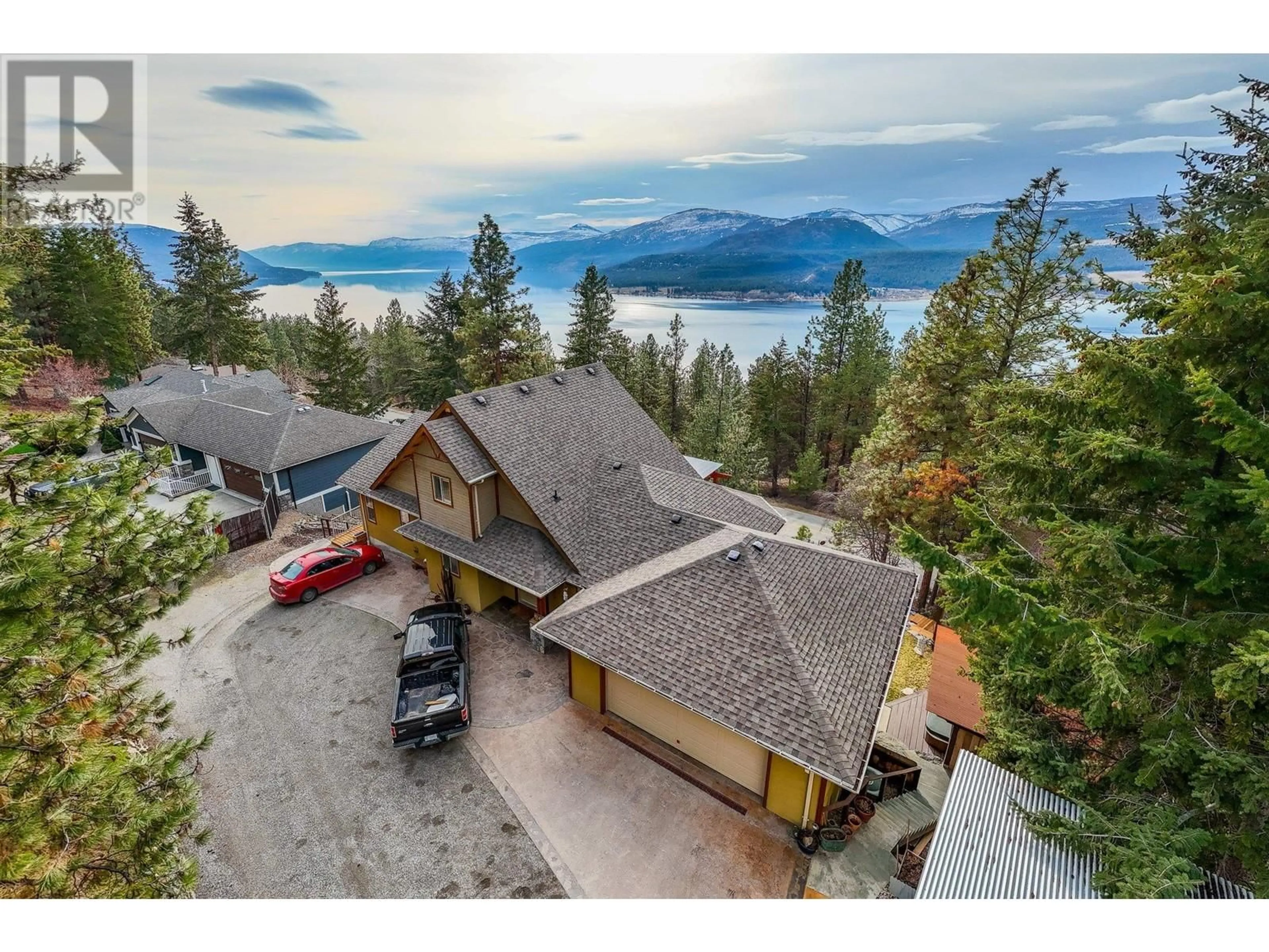 A pic from outside/outdoor area/front of a property/back of a property/a pic from drone, water/lake/river/ocean view for 9143 Tronson Road, Vernon British Columbia V1H1E2