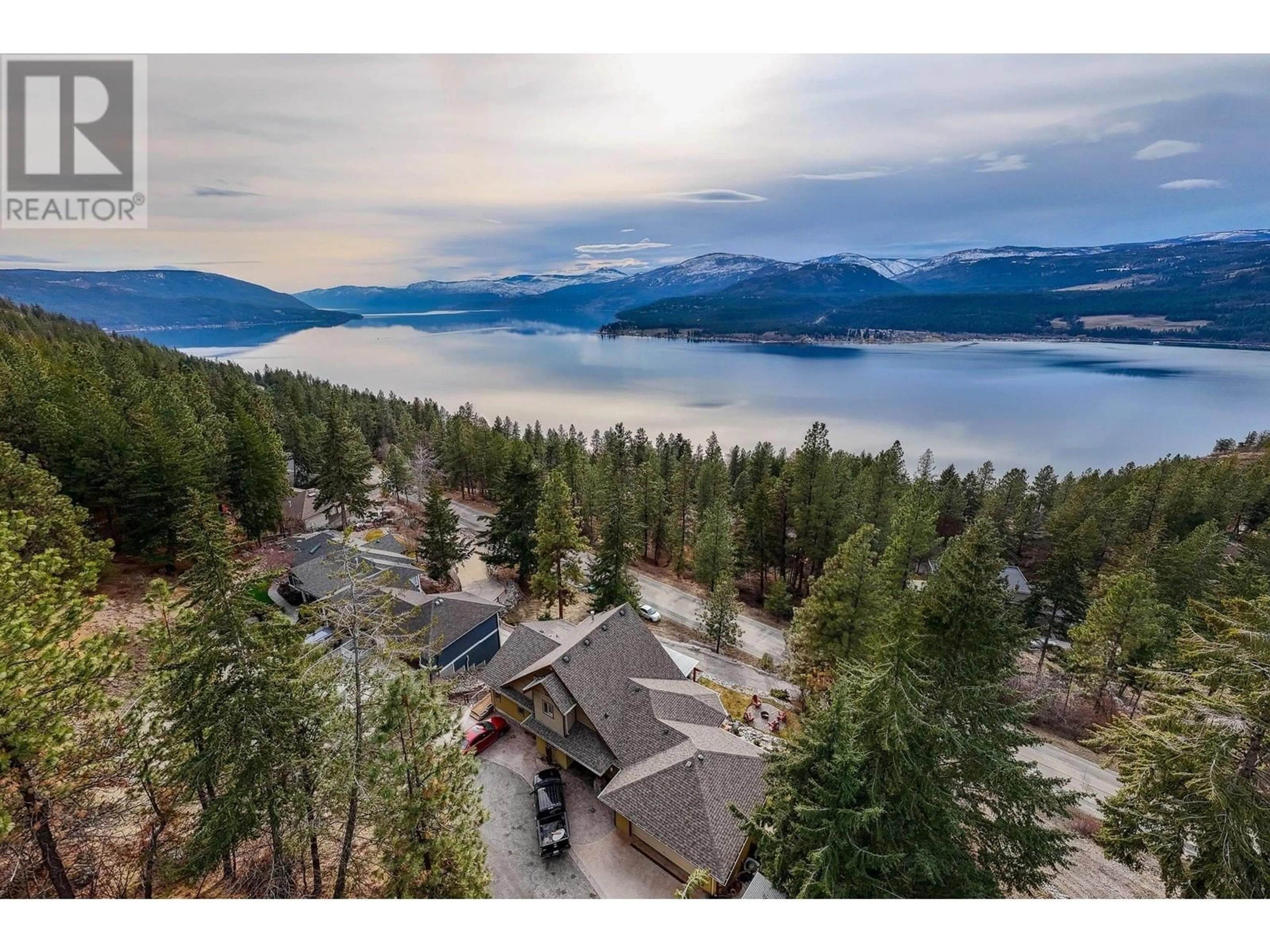 A pic from outside/outdoor area/front of a property/back of a property/a pic from drone, water/lake/river/ocean view for 9143 Tronson Road, Vernon British Columbia V1H1E2