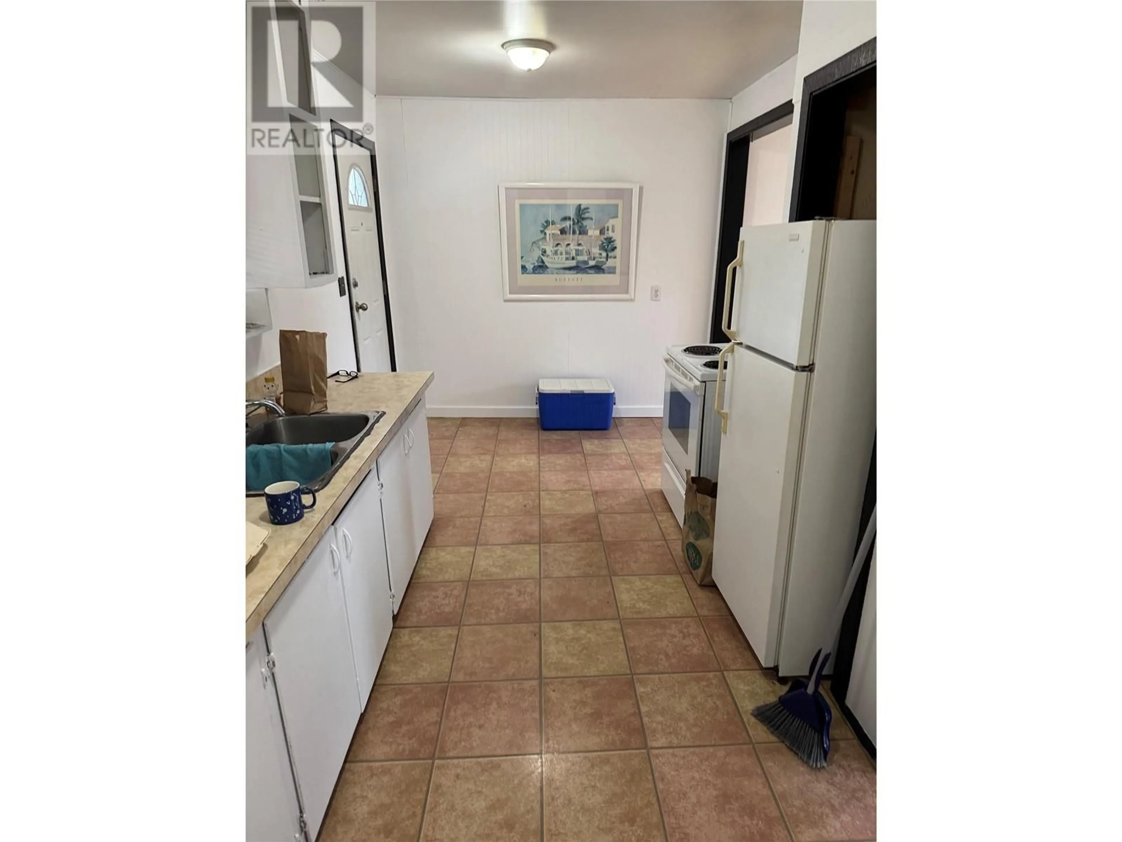 Standard kitchen, ceramic/tile floor for 8709 74TH AVENUE, Osoyoos British Columbia V0H1V0
