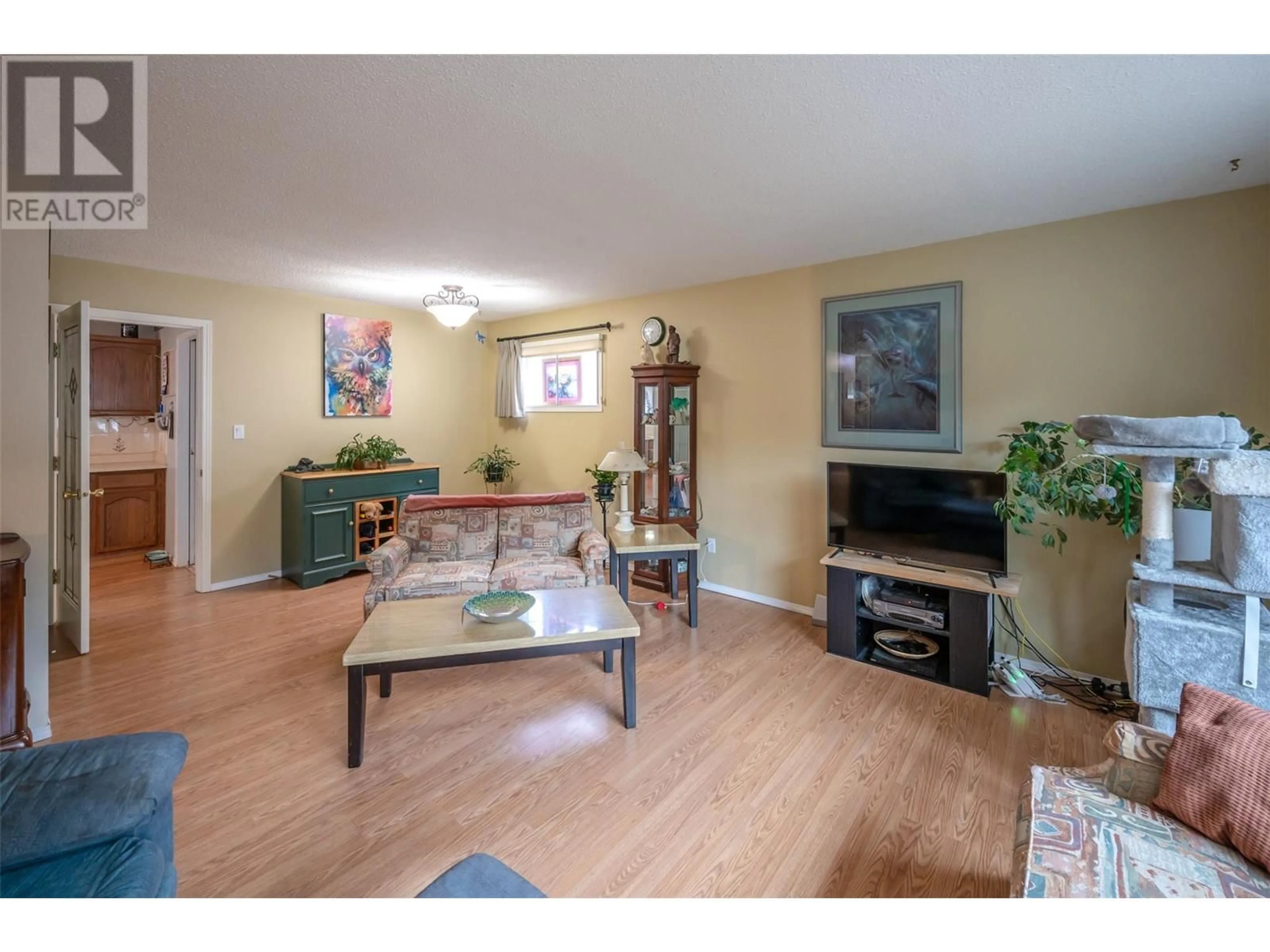 Living room with furniture, unknown for 1725 Duncan Avenue E, Penticton British Columbia V2A7C3