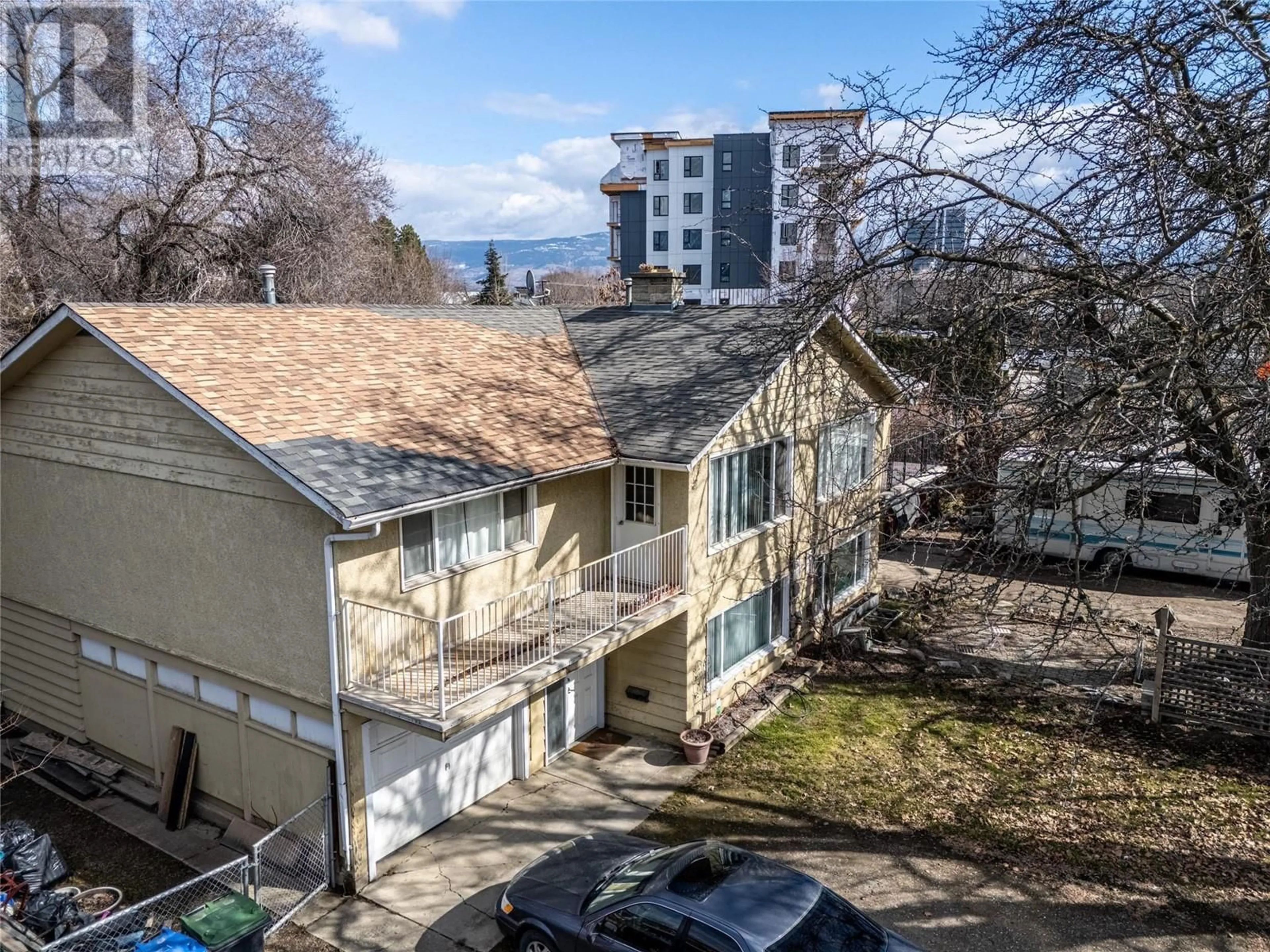 A pic from outside/outdoor area/front of a property/back of a property/a pic from drone, city buildings view from balcony for 1316 PRIDHAM AVENUE, Kelowna British Columbia V1Y6B5