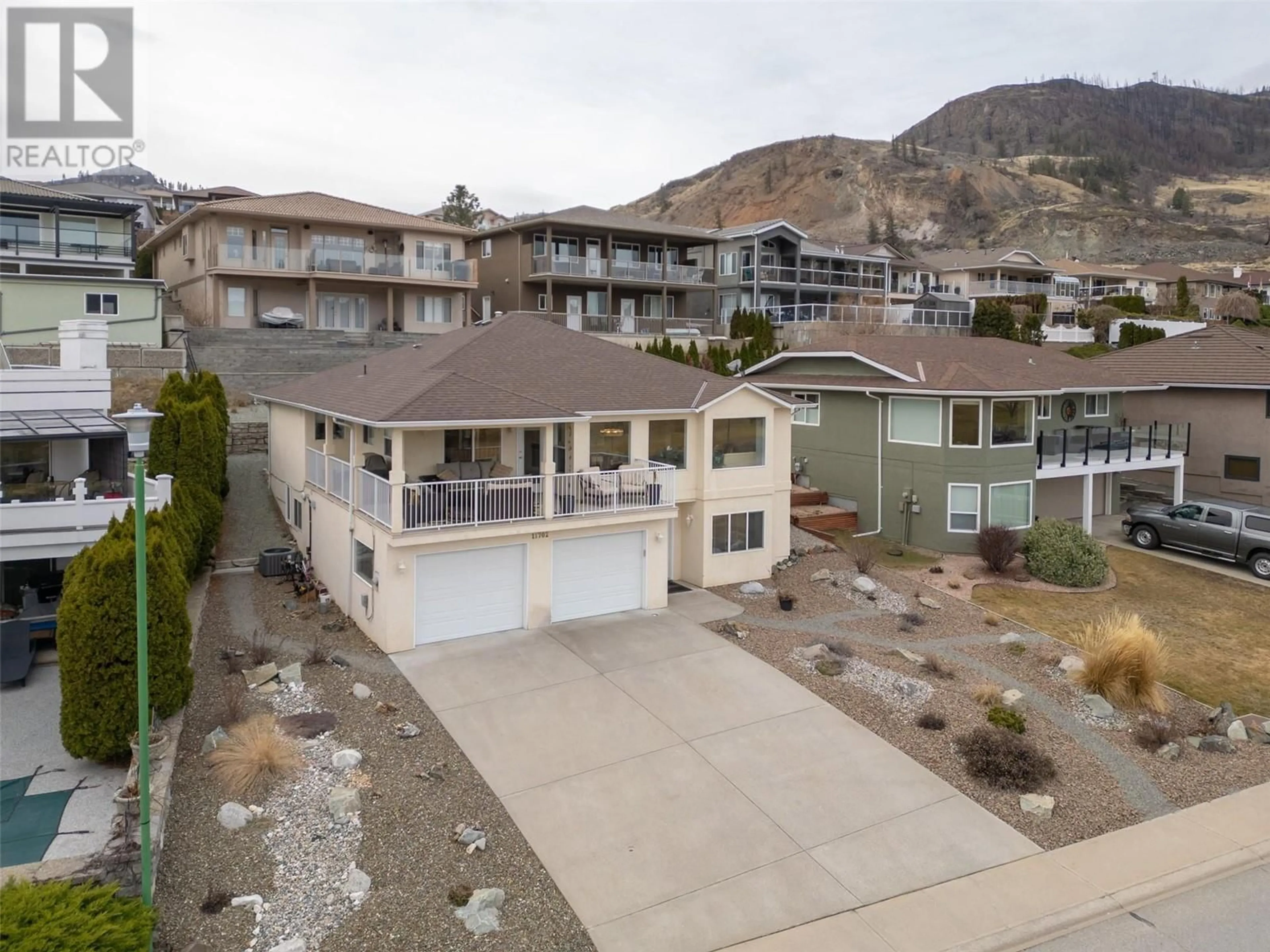 A pic from outside/outdoor area/front of a property/back of a property/a pic from drone, mountain view for 11702 GOLF COURSE DRIVE, Osoyoos British Columbia V0H1V4