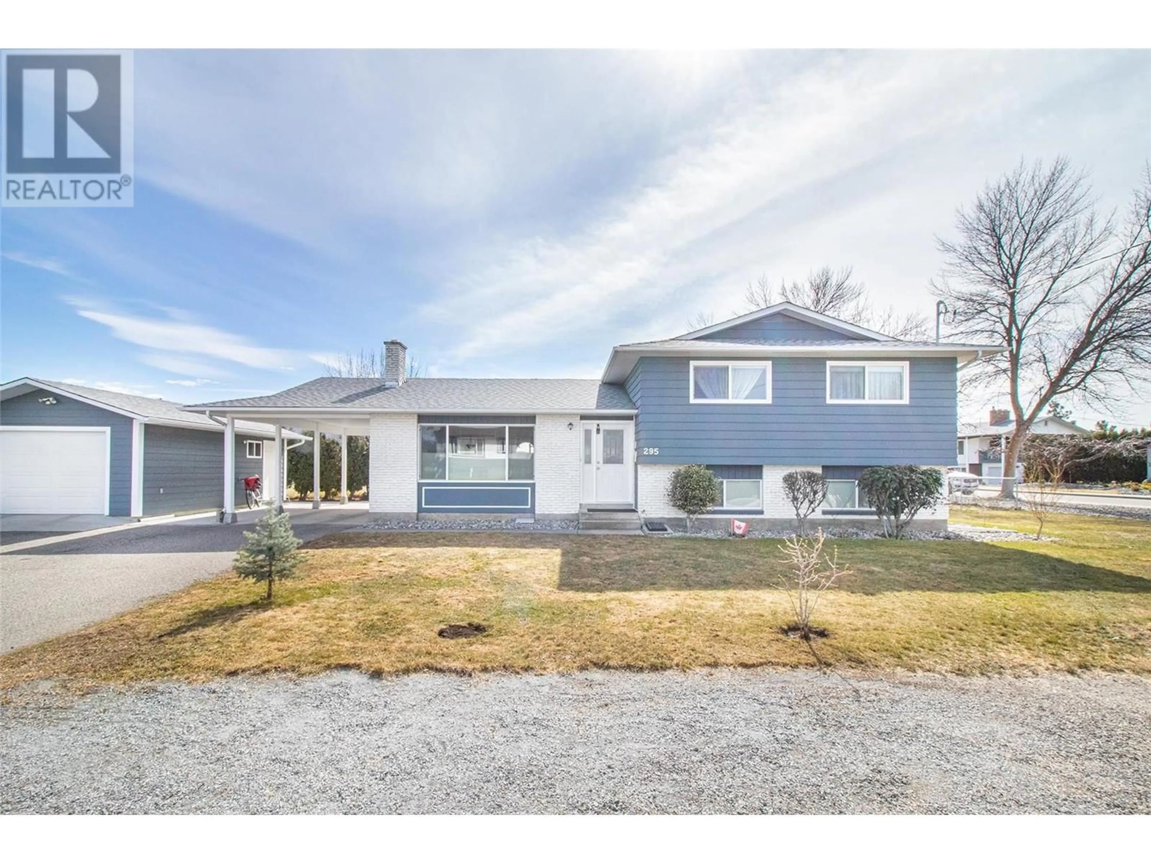 Home with vinyl exterior material, street for 295 VENUS ROAD, Kelowna British Columbia V1X1H6